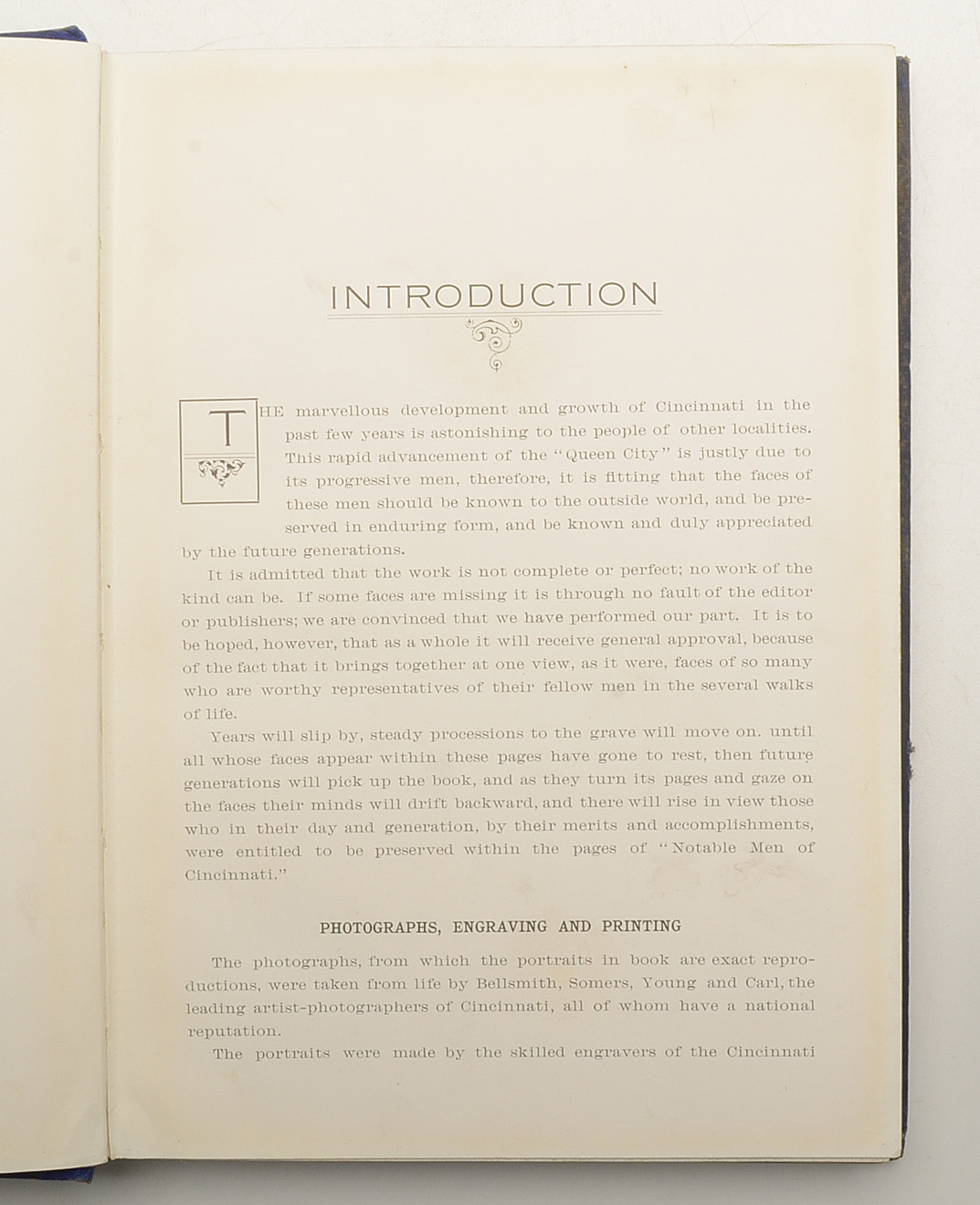 Collection of Vintage Books and Mounted Photographs