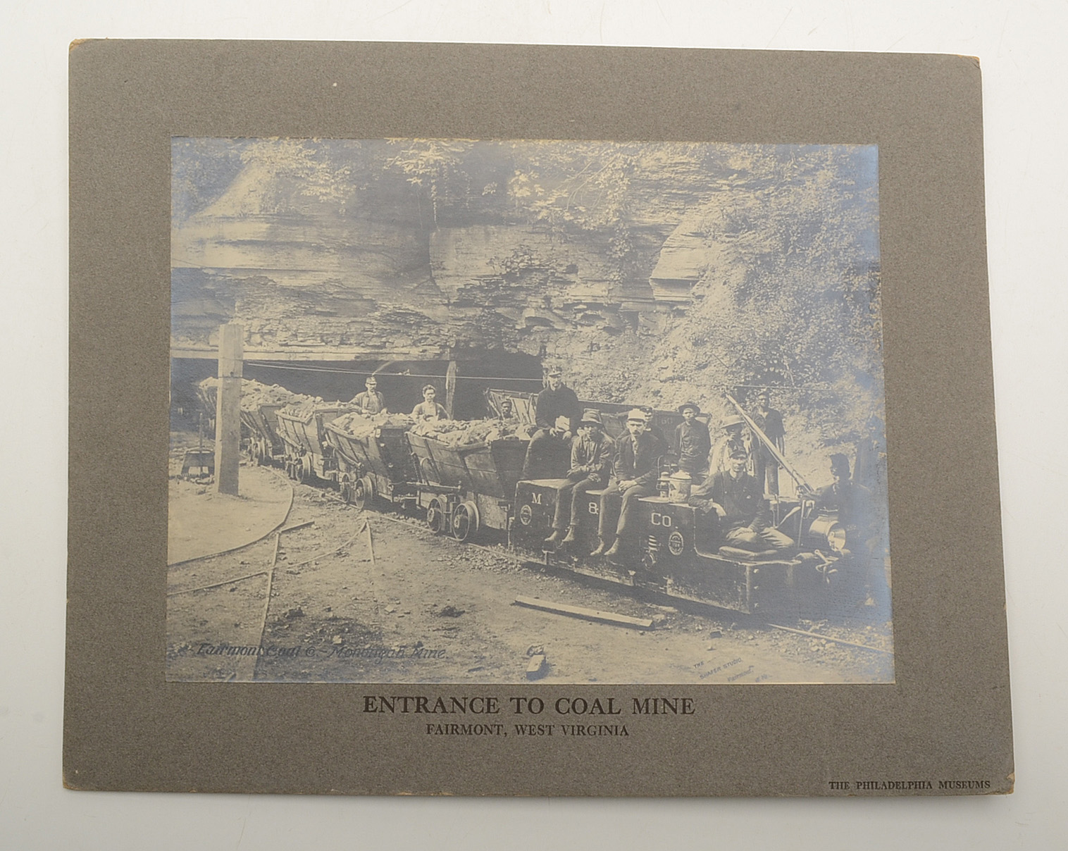 Collection of Vintage Books and Mounted Photographs