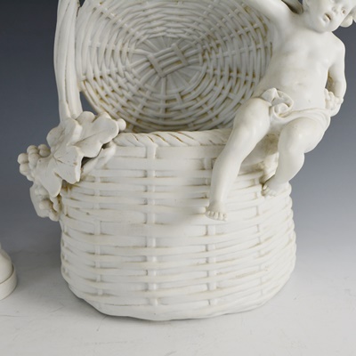 White Bisque Porcelian Cherub Basket and Cherub Statue