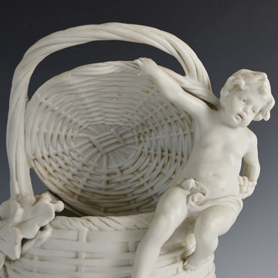 White Bisque Porcelian Cherub Basket and Cherub Statue