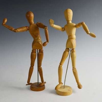 Two Wood Artist Mannequin Drawing Figures