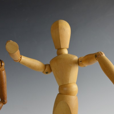 Two Wood Artist Mannequin Drawing Figures