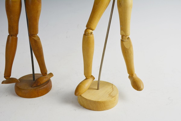 Two Wood Artist Mannequin Drawing Figures