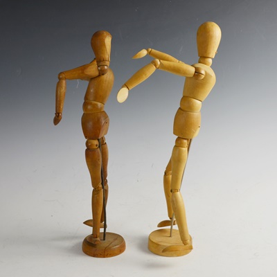 Two Wood Artist Mannequin Drawing Figures