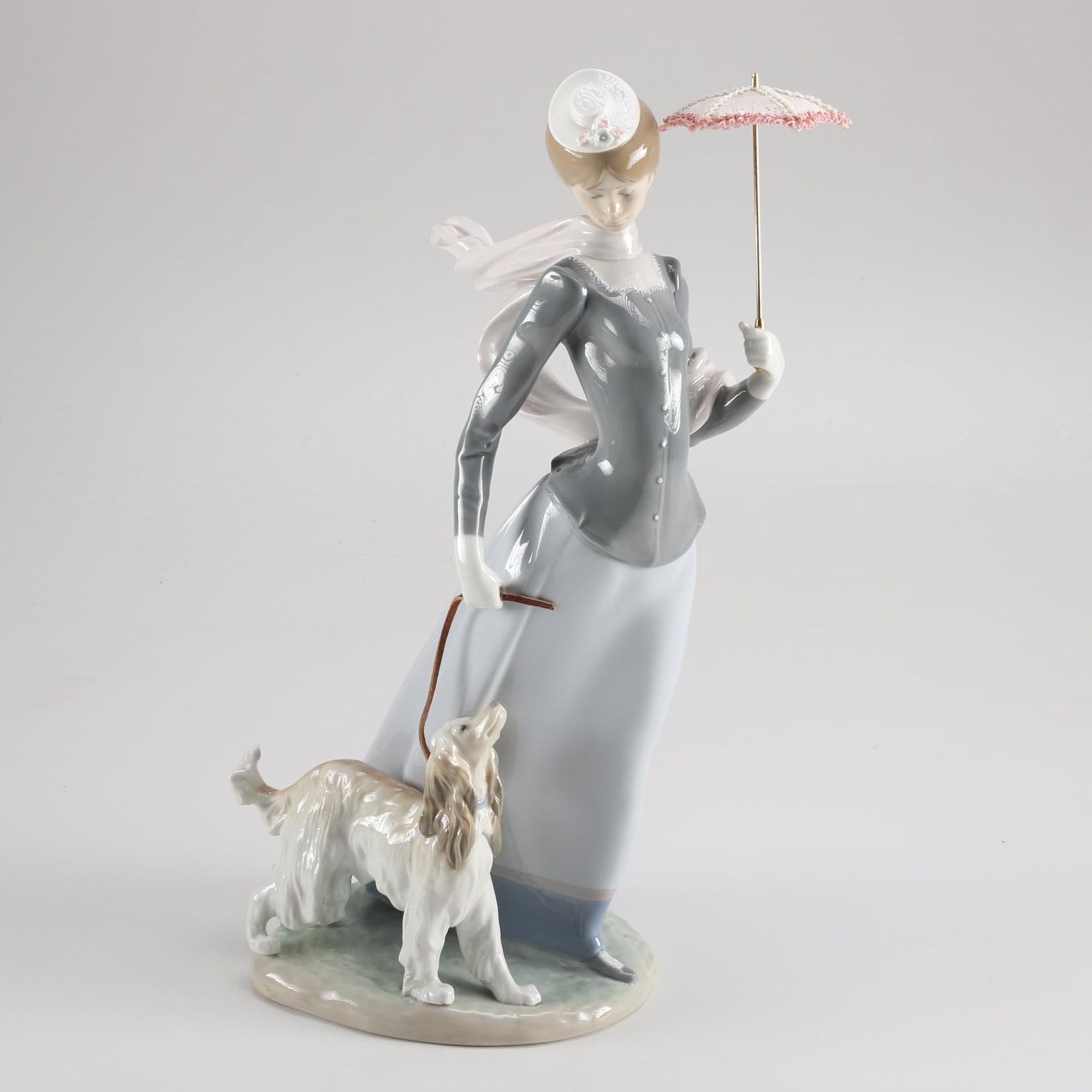 Lladró Woman and Dog Porcelain Figurine