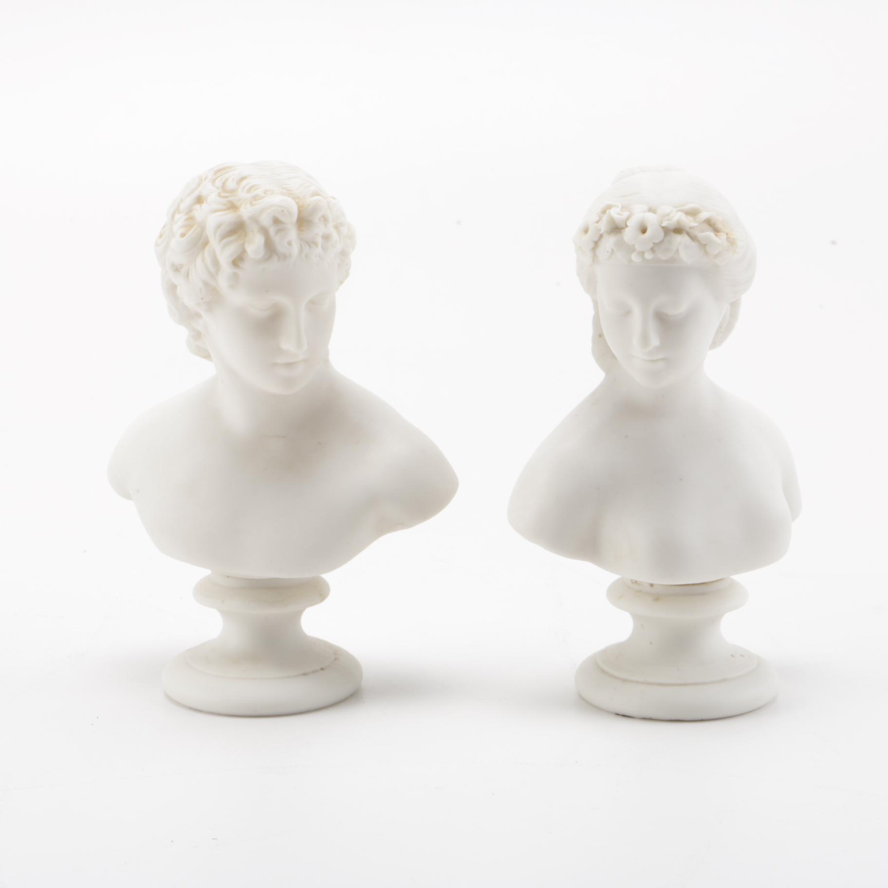 Cupid and Flora Porcelain Busts