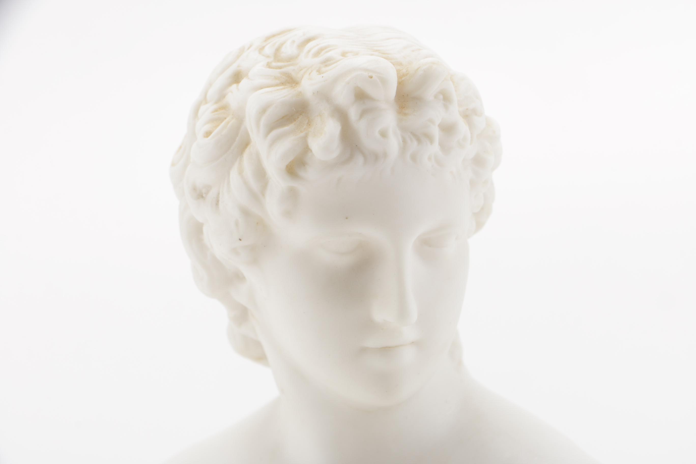 Cupid and Flora Porcelain Busts