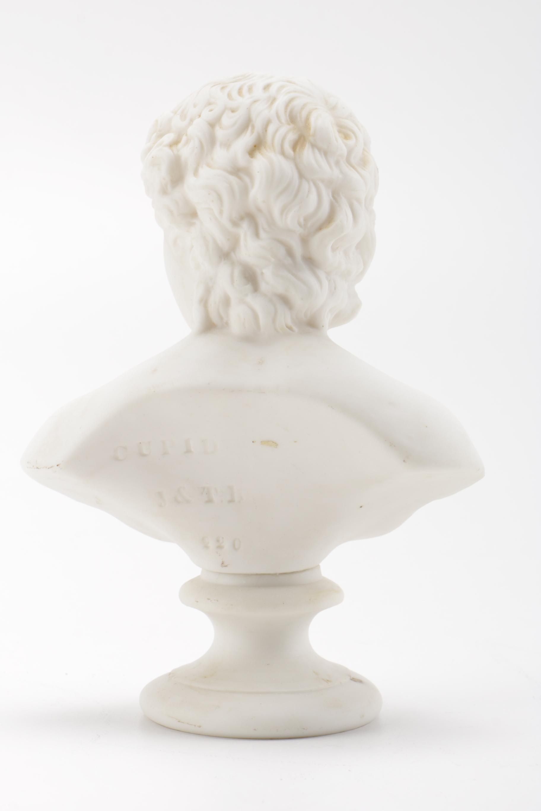 Cupid and Flora Porcelain Busts