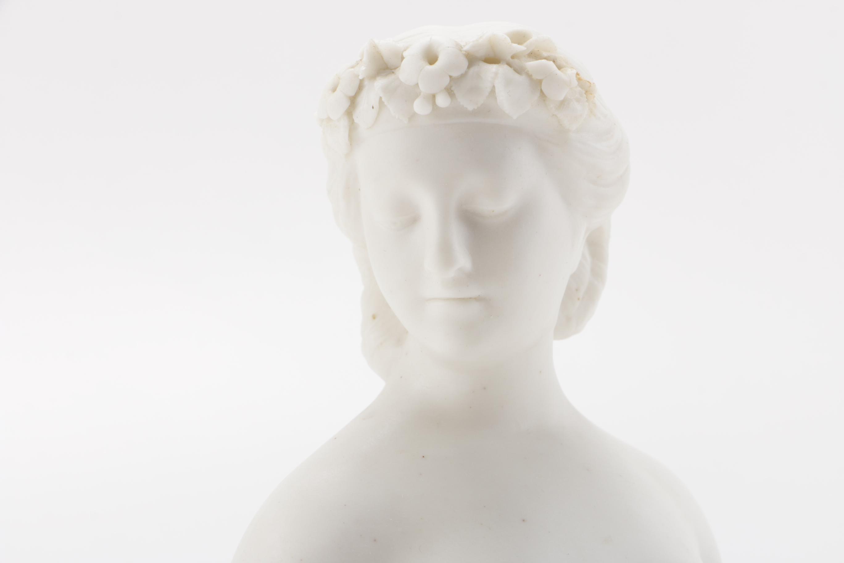 Cupid and Flora Porcelain Busts