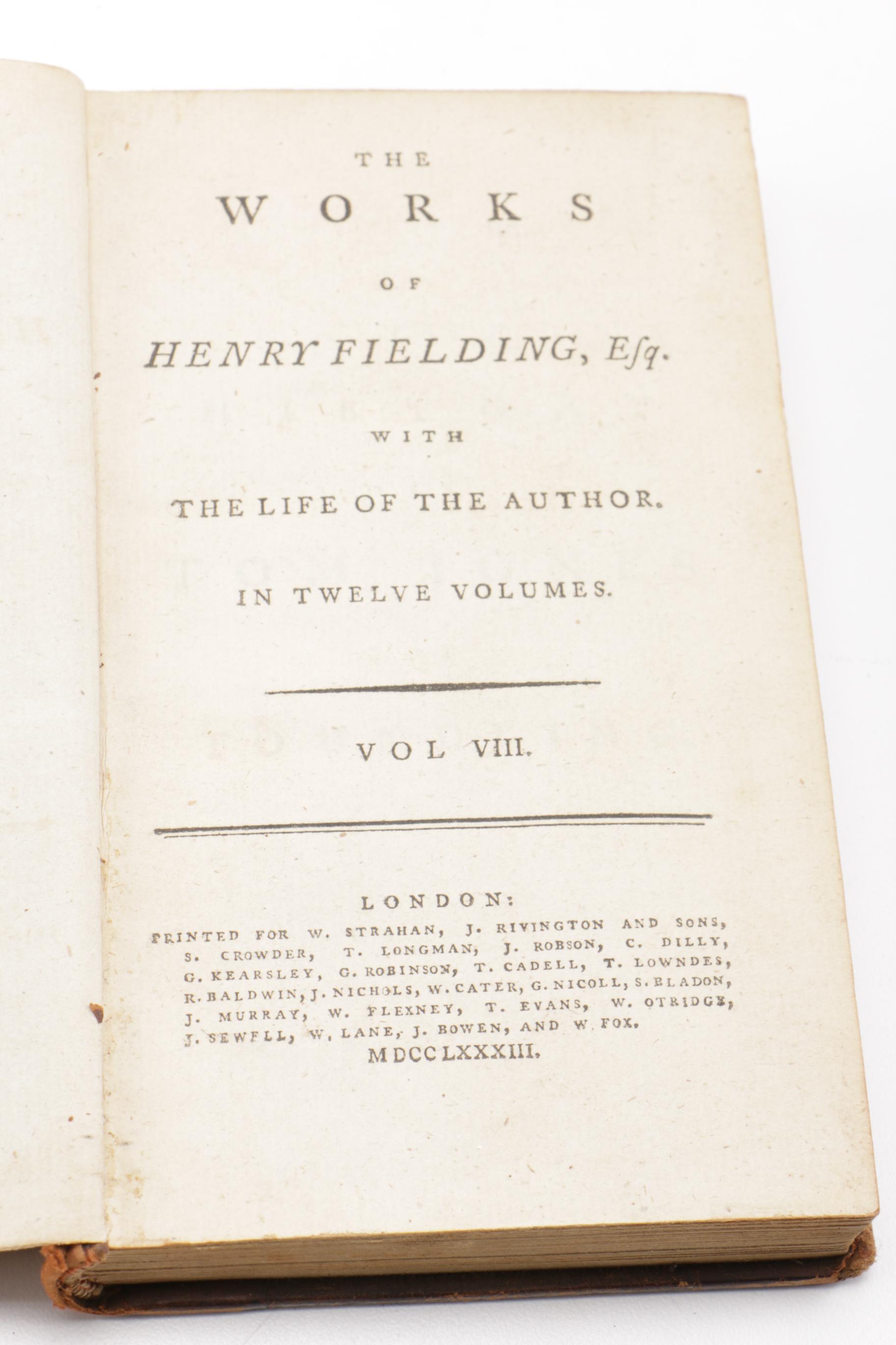 Eight of Twelve Volumes of "The Works of Henry Fielding"
