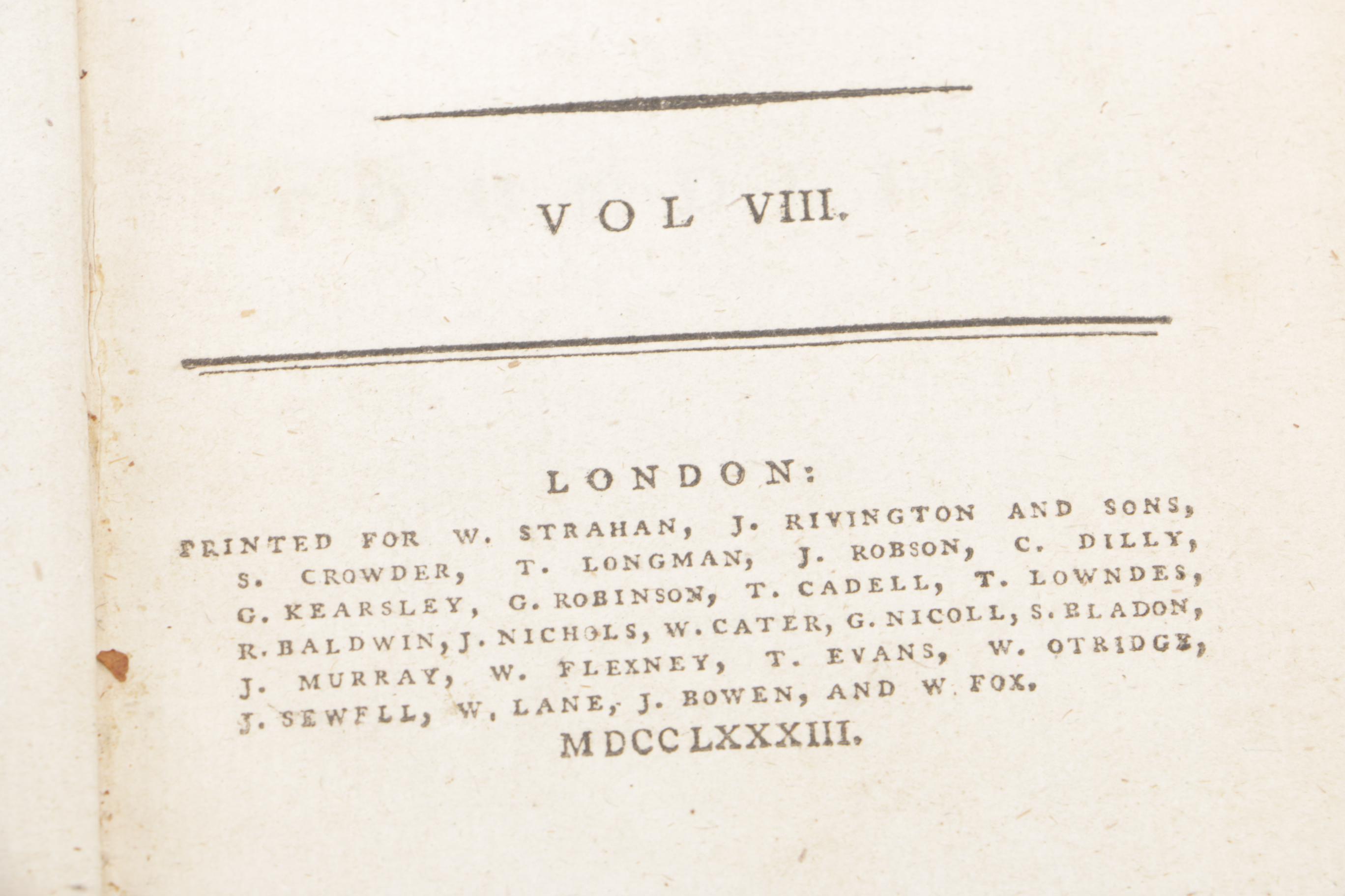Eight of Twelve Volumes of "The Works of Henry Fielding"