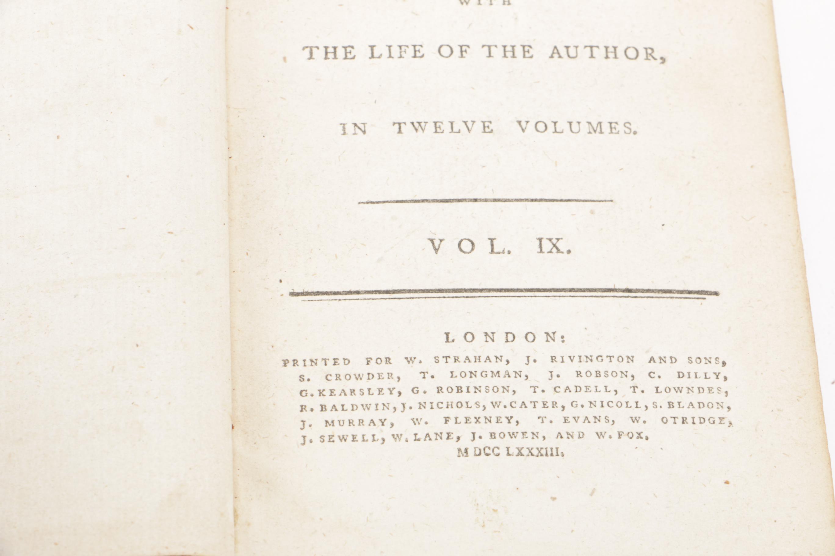 Eight of Twelve Volumes of "The Works of Henry Fielding"