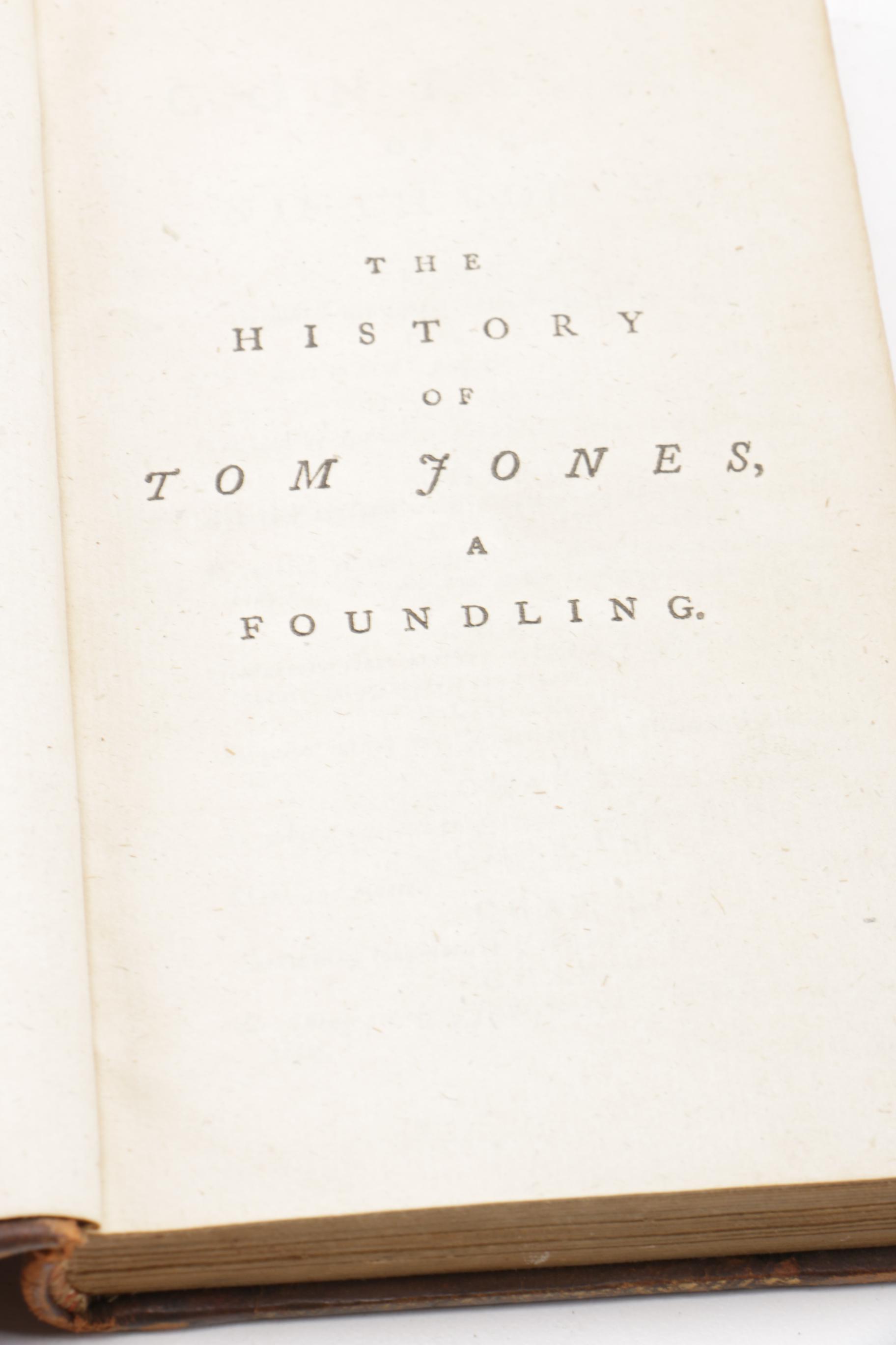 Eight of Twelve Volumes of "The Works of Henry Fielding"