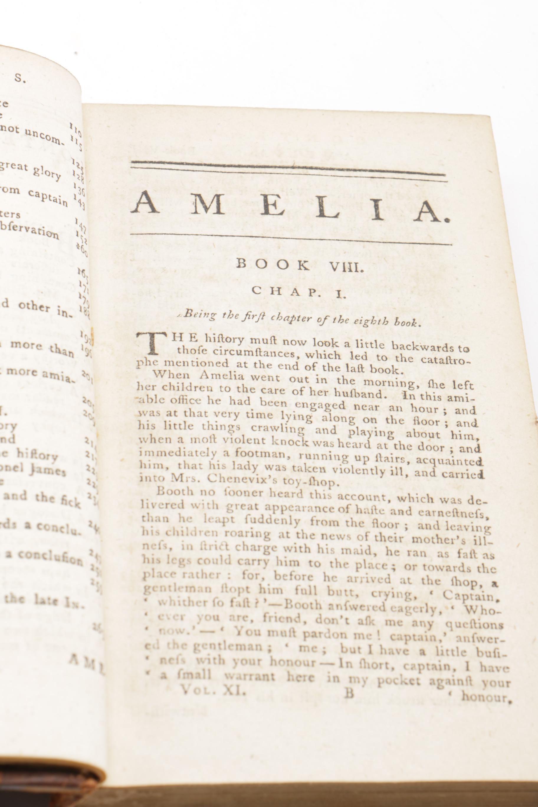 Eight of Twelve Volumes of "The Works of Henry Fielding"