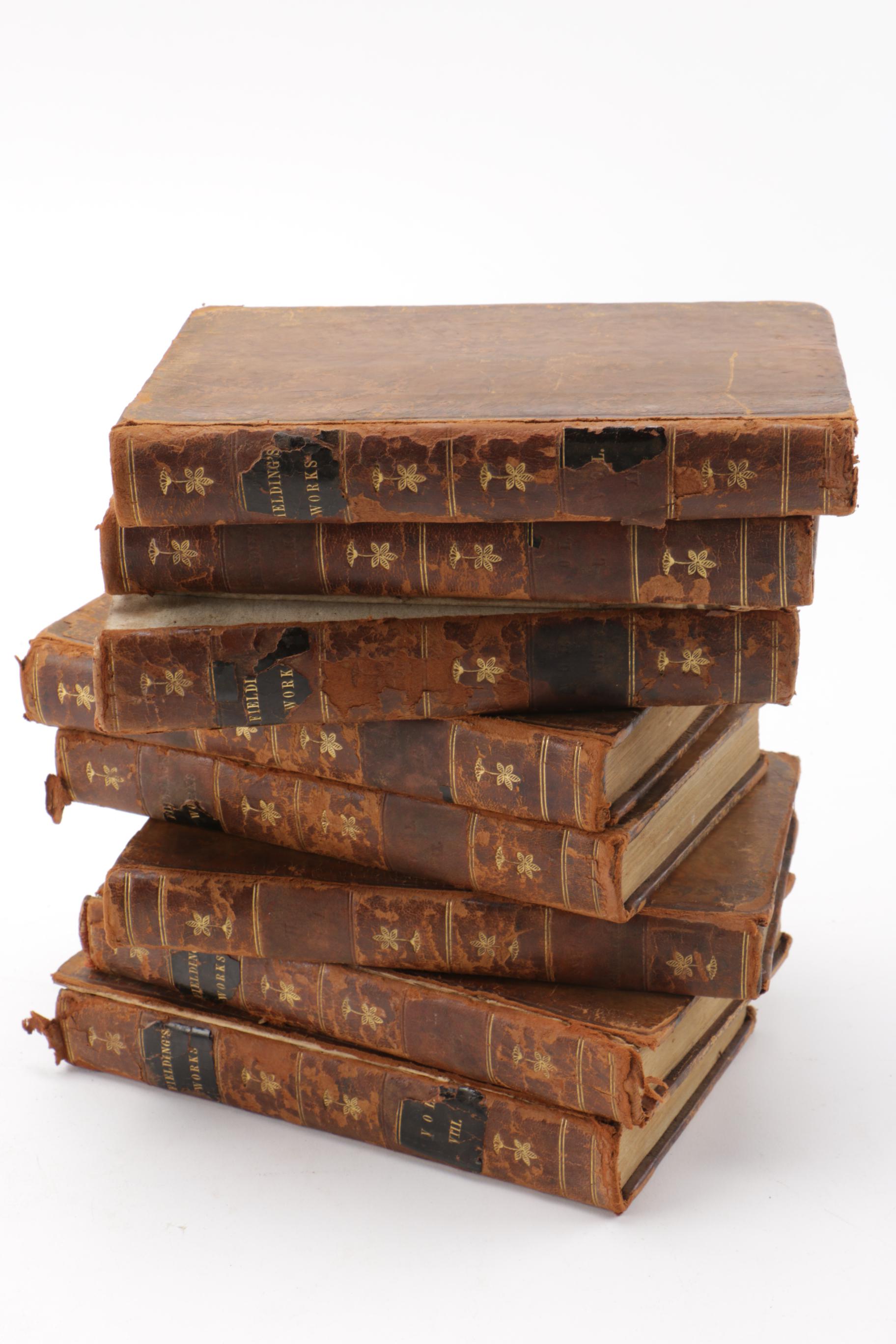 Eight of Twelve Volumes of "The Works of Henry Fielding"