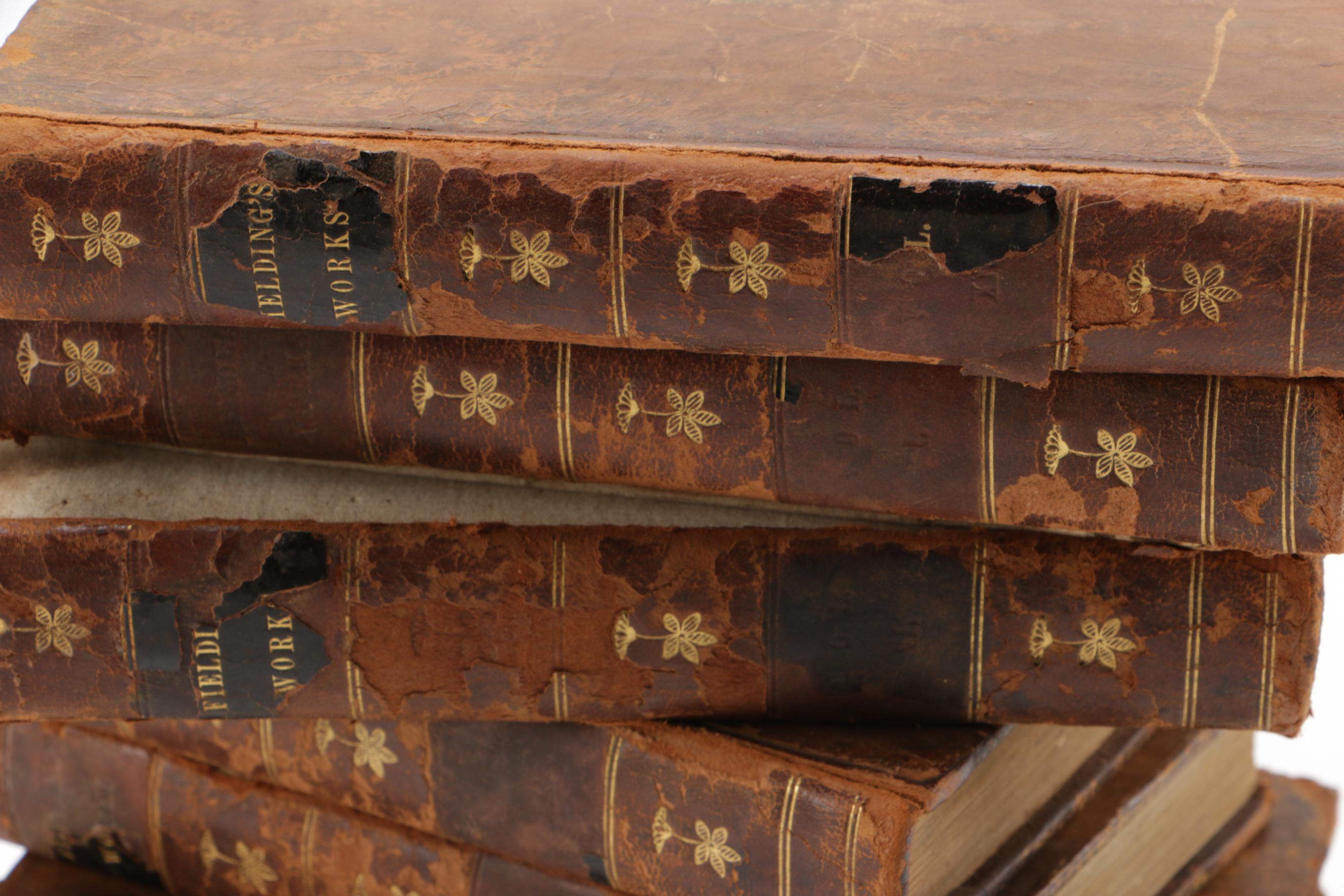 Eight of Twelve Volumes of "The Works of Henry Fielding"