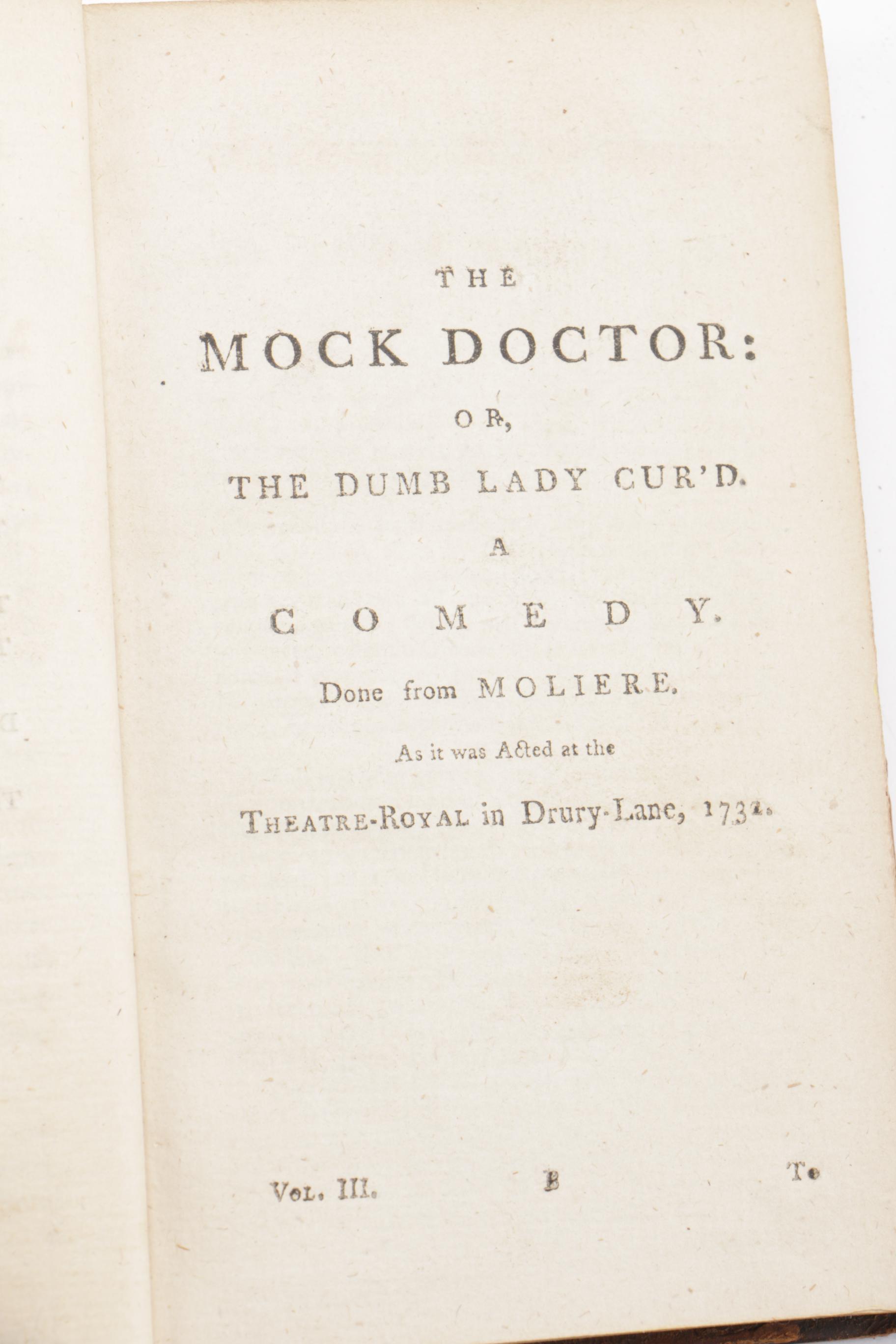 Eight of Twelve Volumes of "The Works of Henry Fielding"
