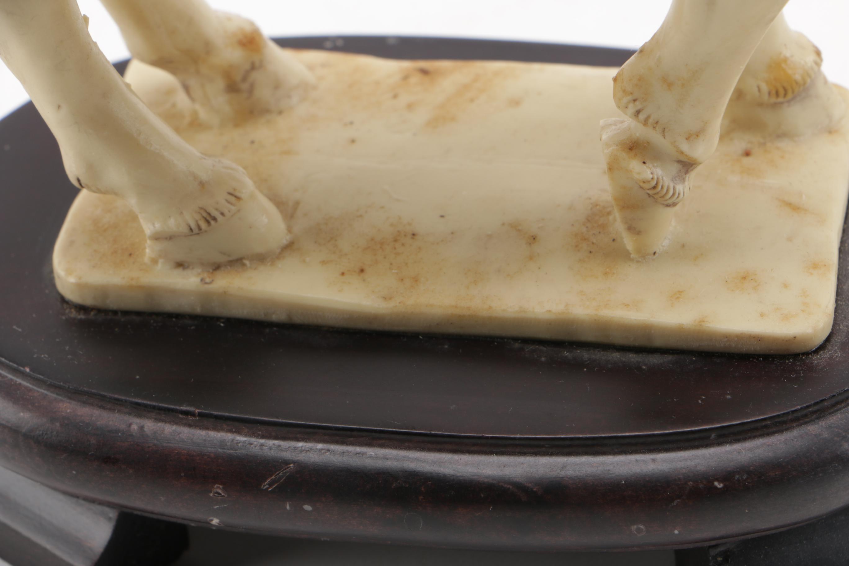 Pair of Off-White Resin Animal Figurines