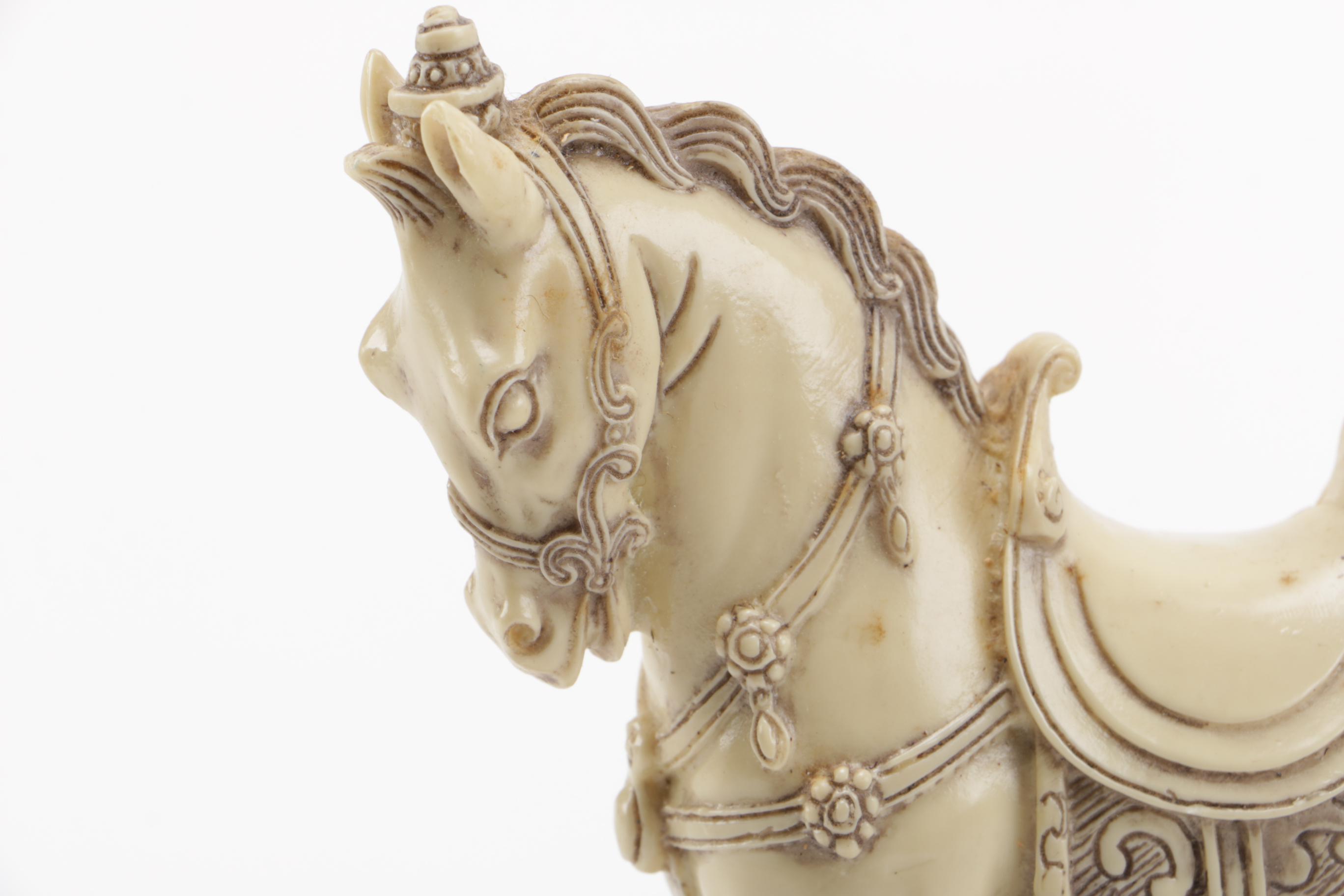 Pair of Off-White Resin Animal Figurines