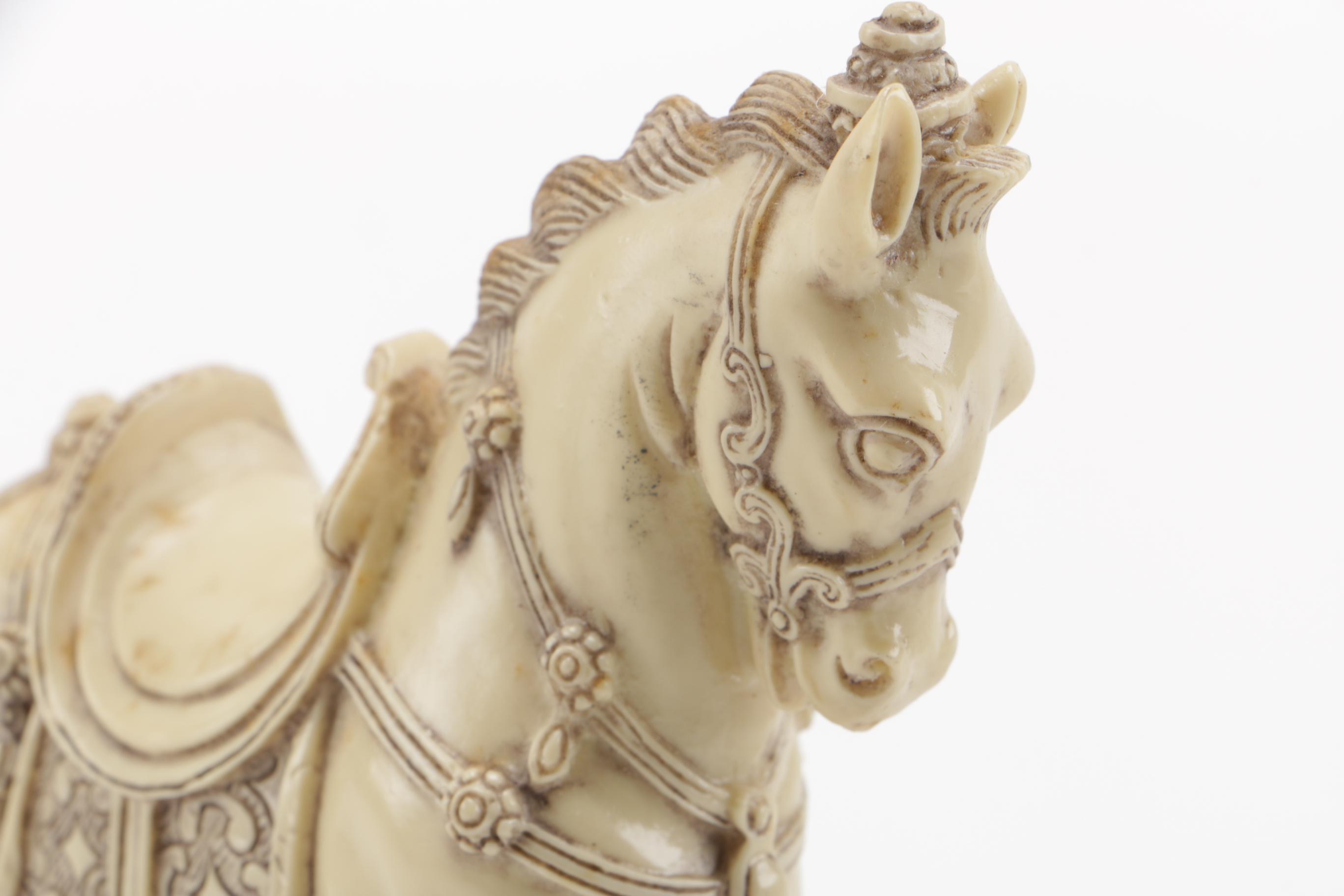 Pair of Off-White Resin Animal Figurines