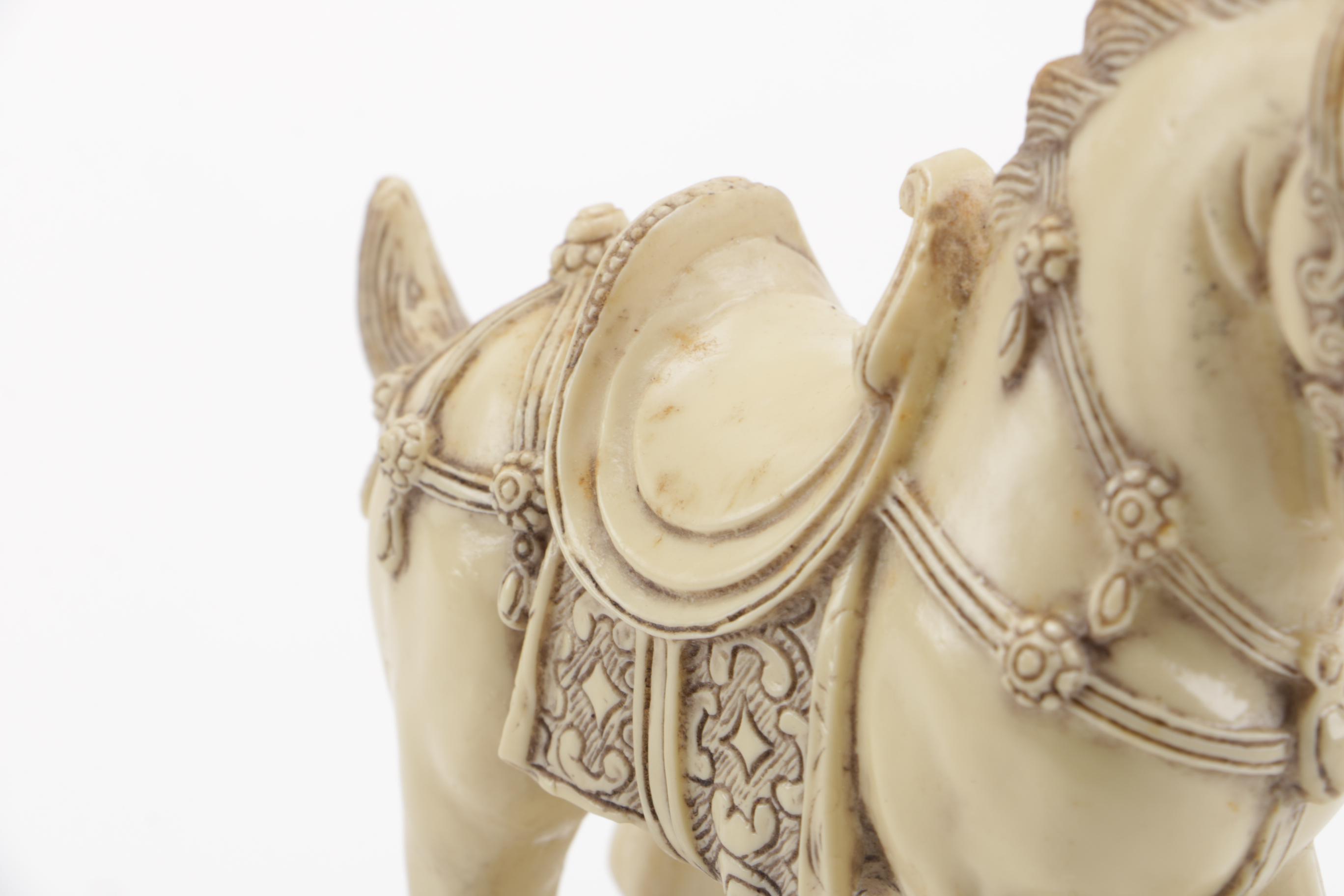 Pair of Off-White Resin Animal Figurines