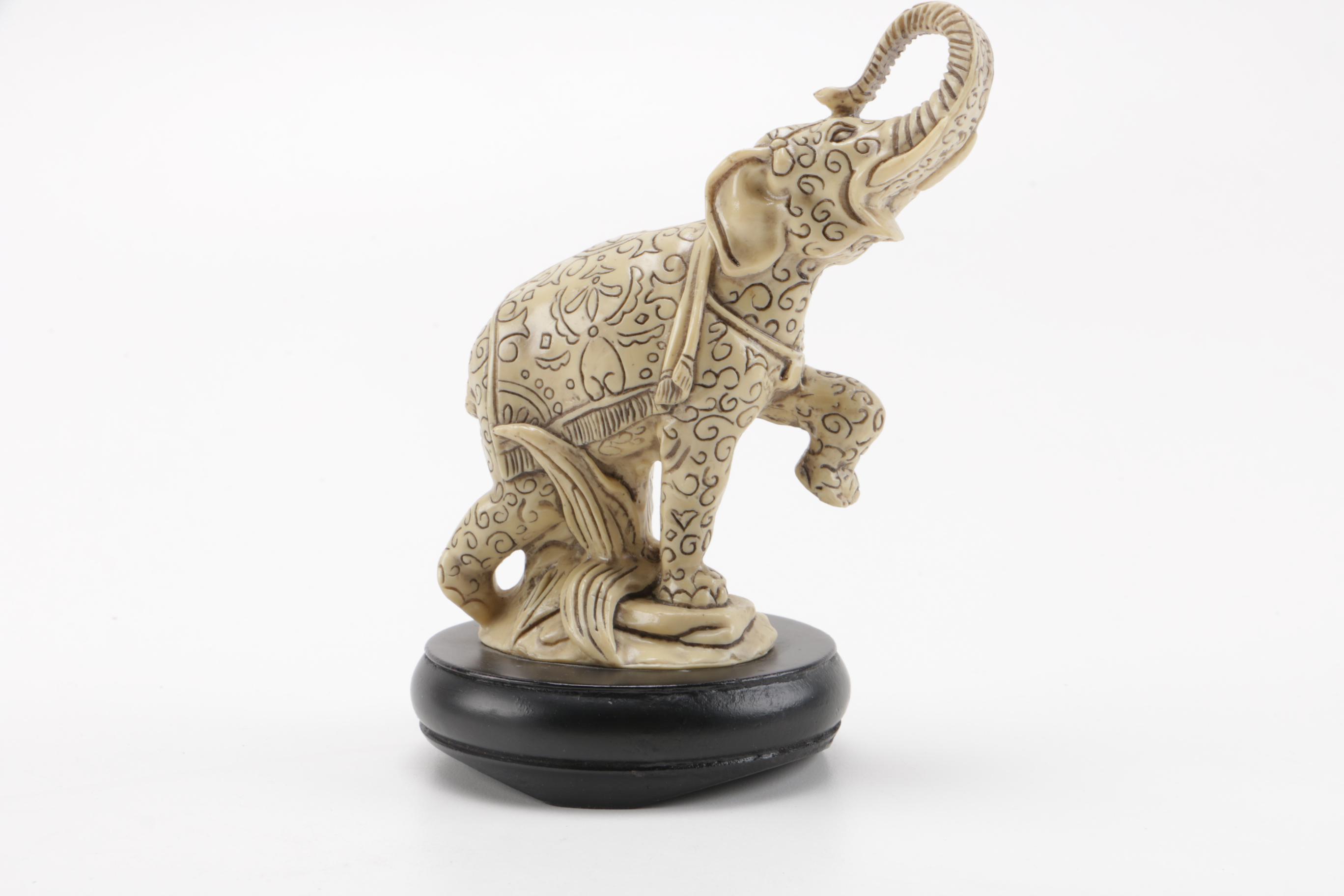 Pair of Off-White Resin Animal Figurines