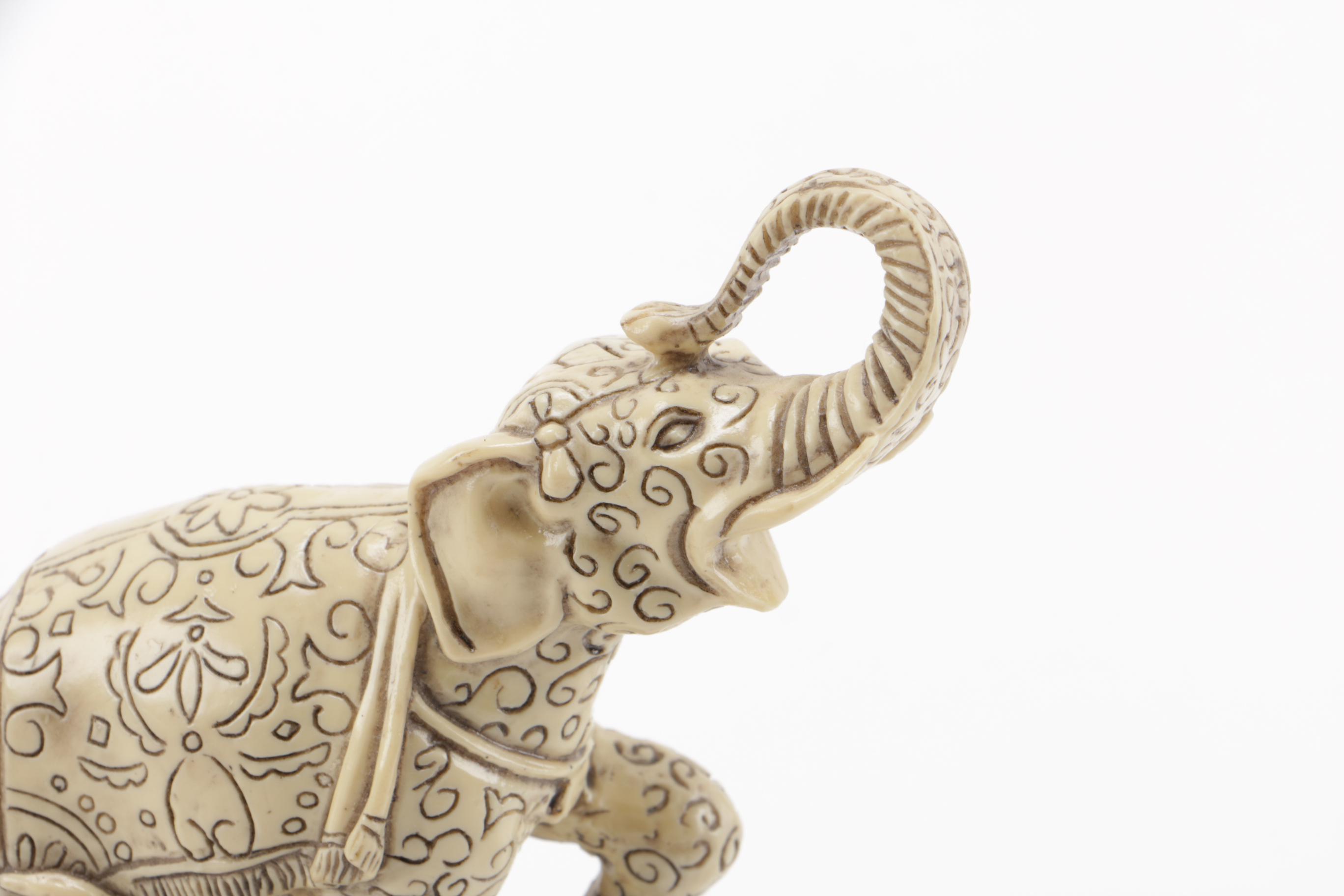 Pair of Off-White Resin Animal Figurines