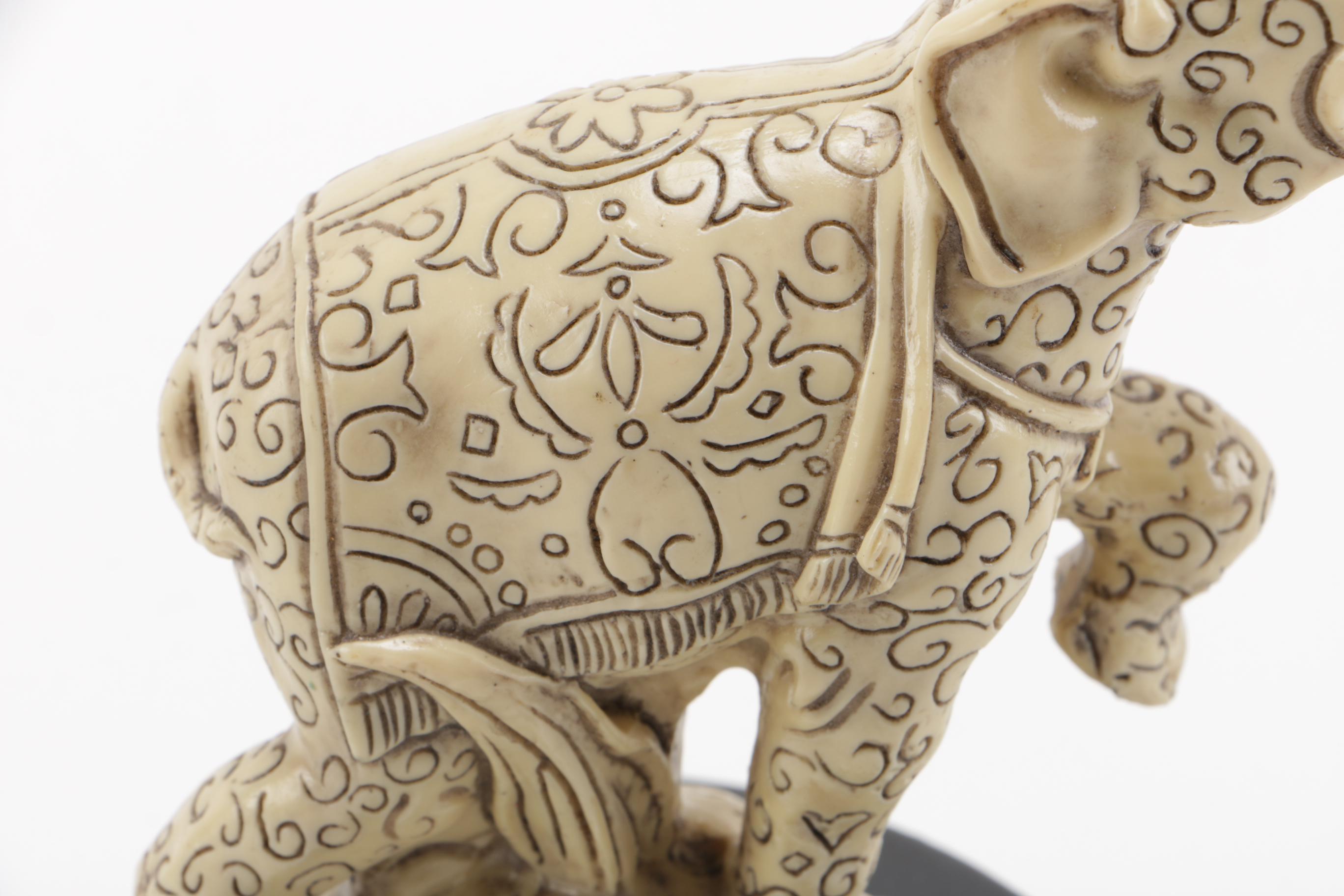 Pair of Off-White Resin Animal Figurines