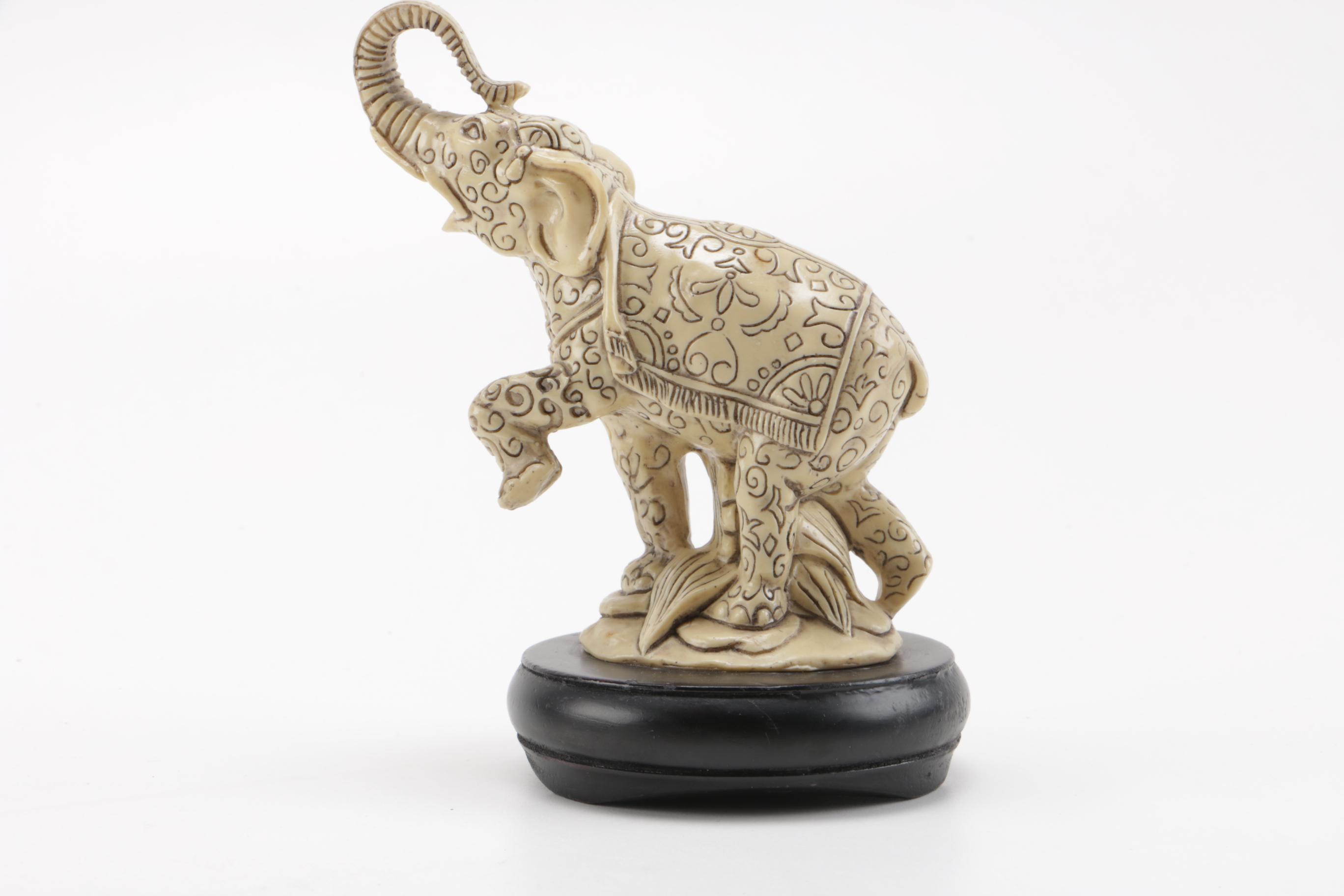 Pair of Off-White Resin Animal Figurines