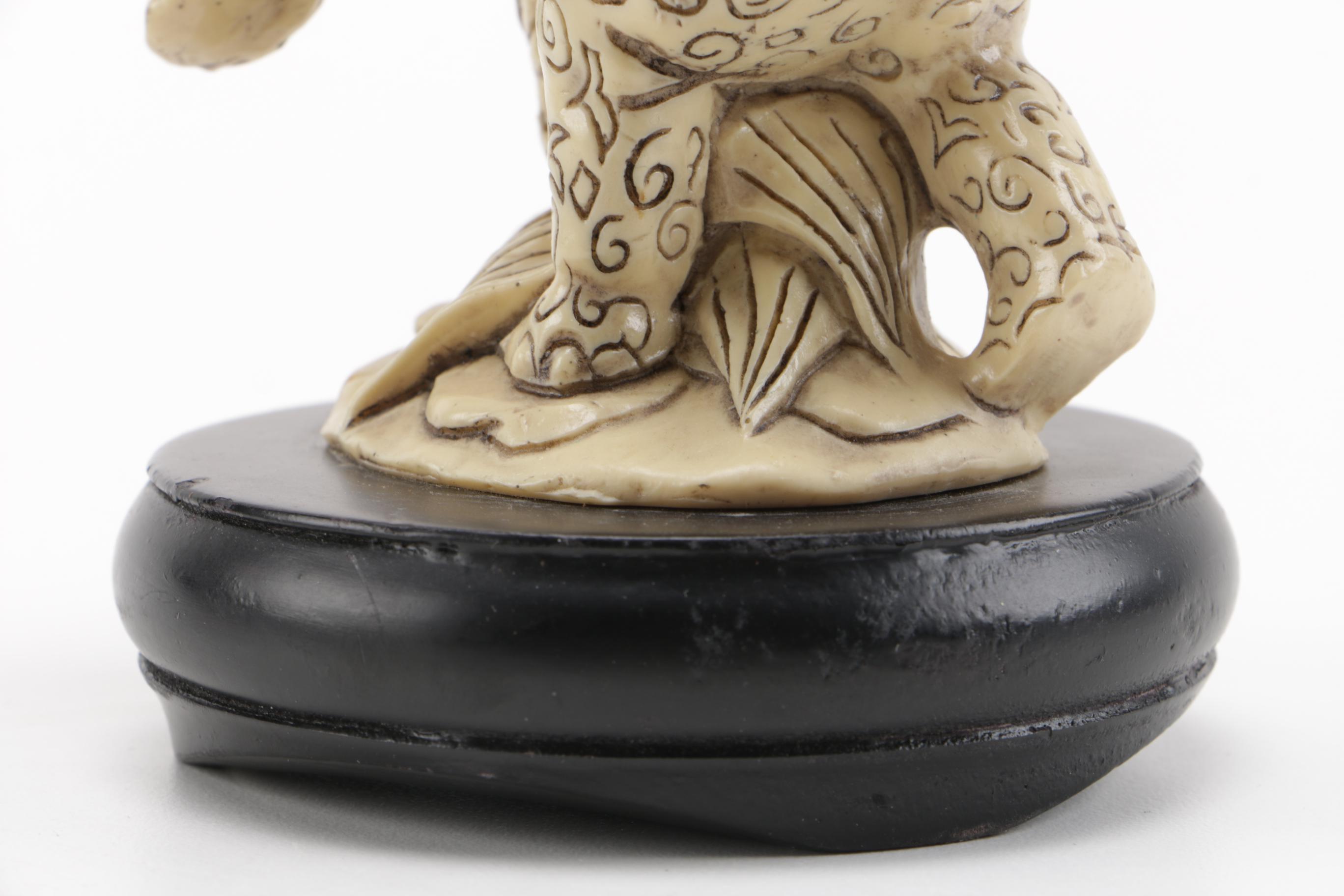 Pair of Off-White Resin Animal Figurines