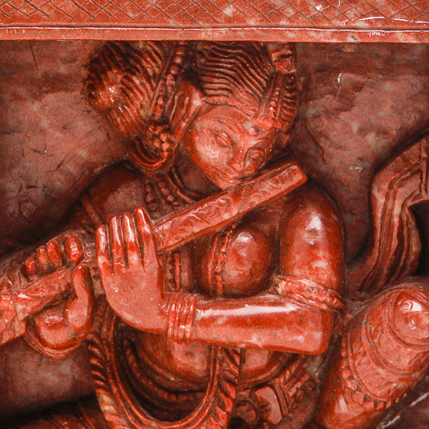 Indian Stone Carving of Woman Playing a Flute