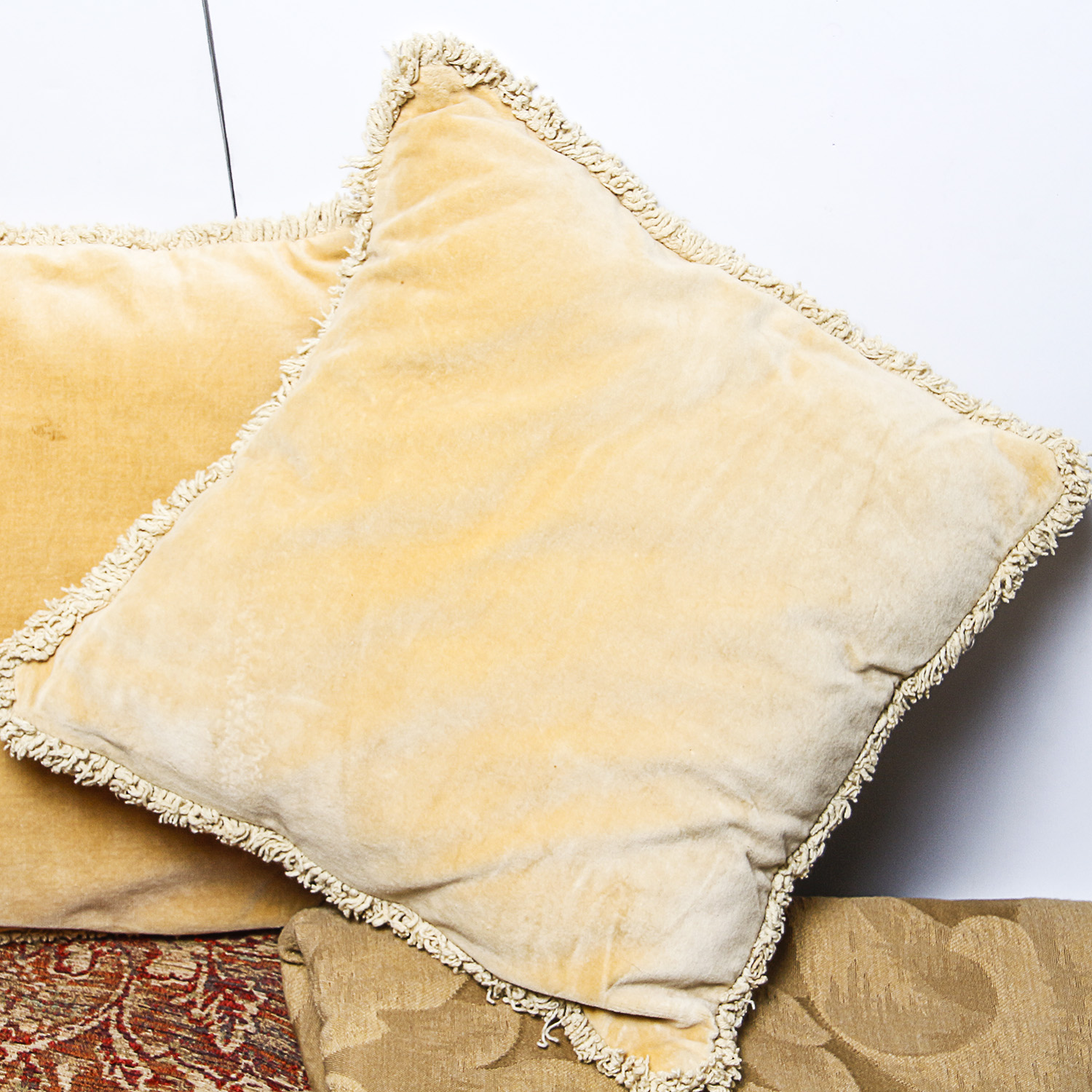 Collection of Upholstery Fabric and Decorative Pillows