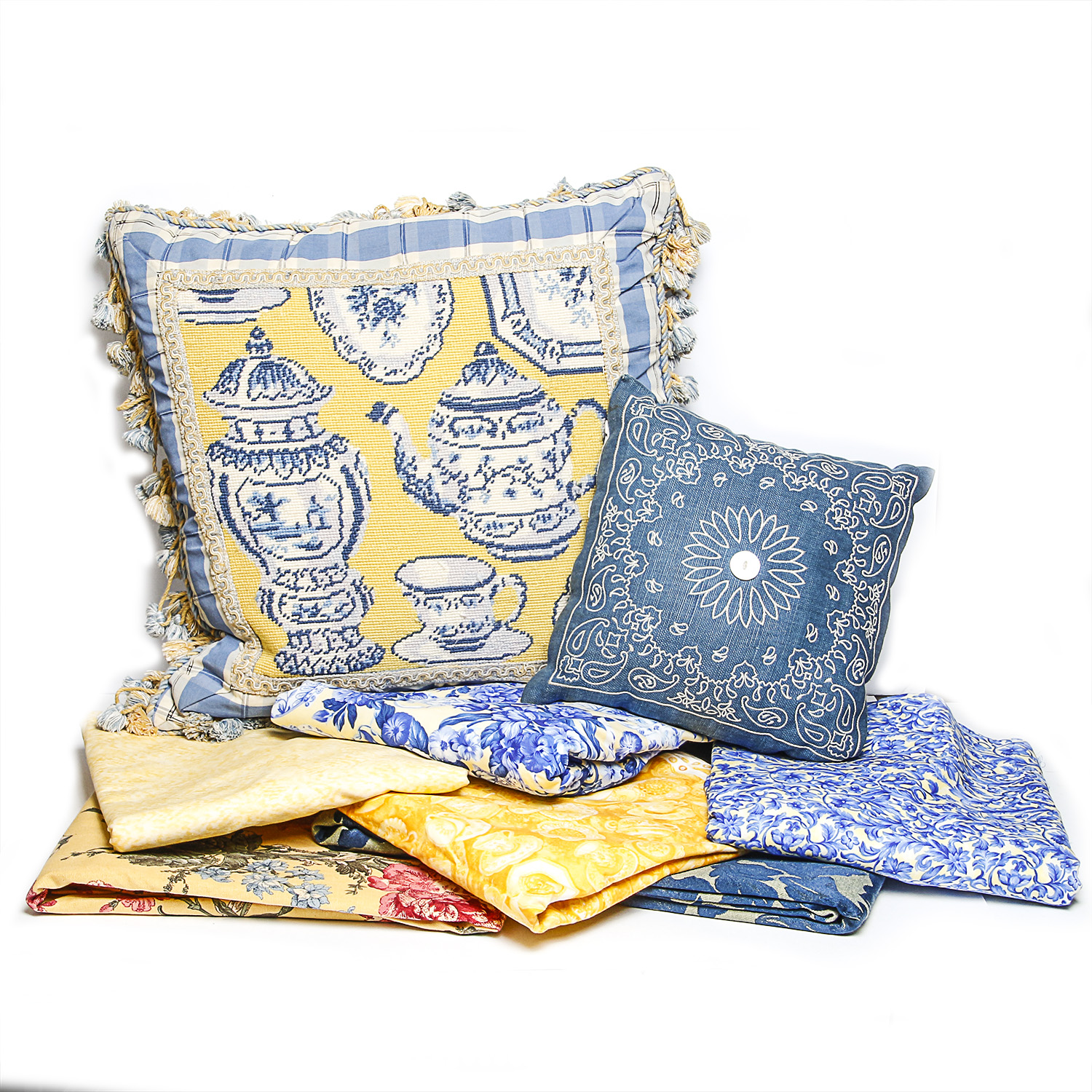 Collection of Decorative Pillows and Fabric Pieces