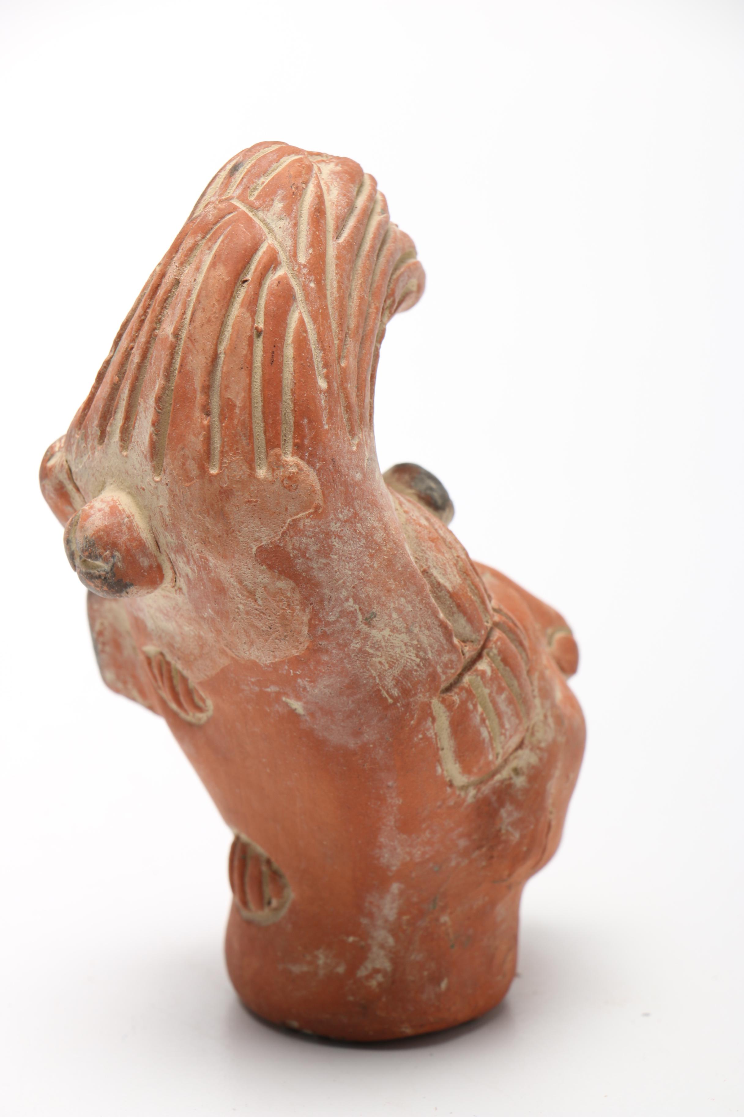 Pair Of Carved Faces