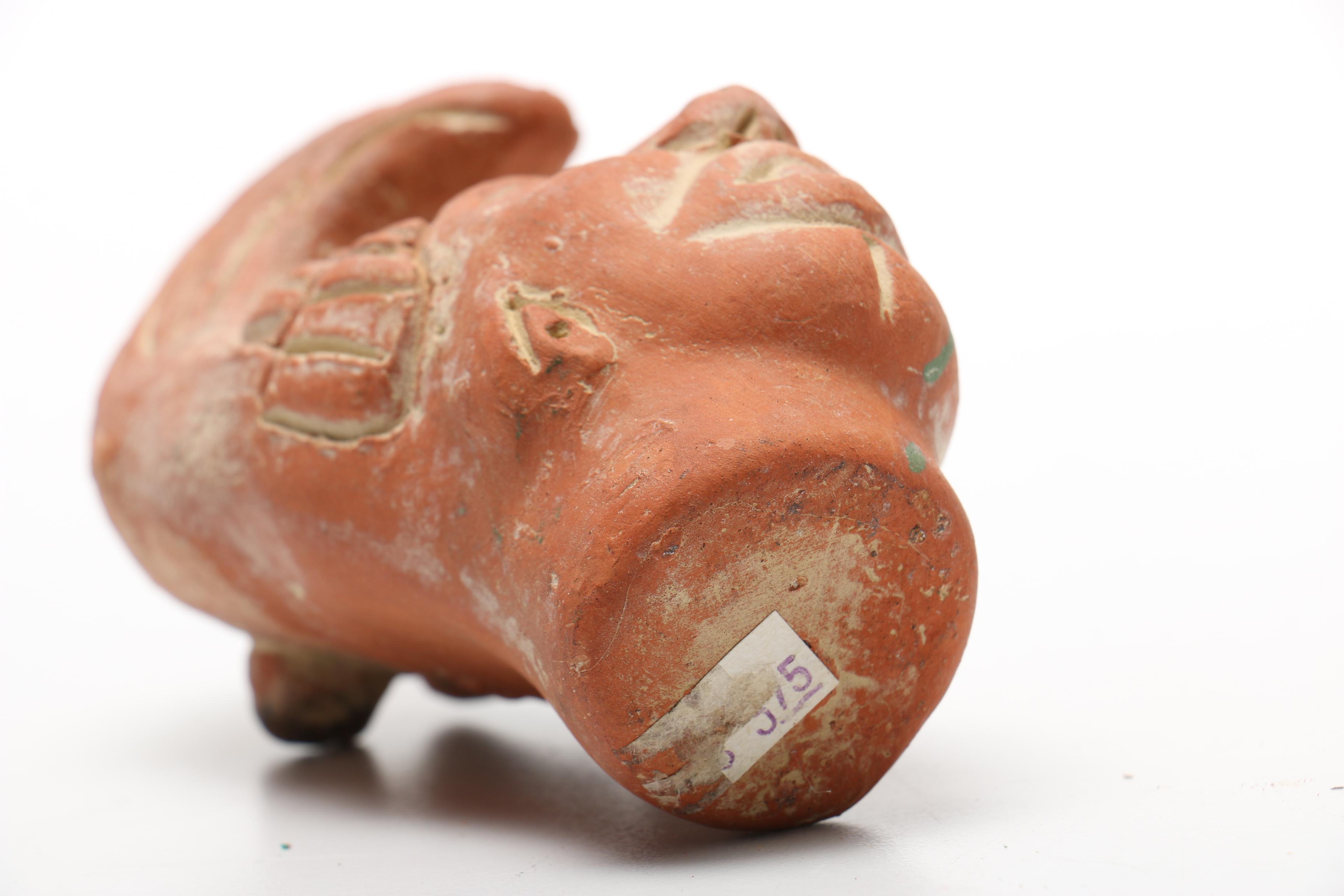 Pair Of Carved Faces