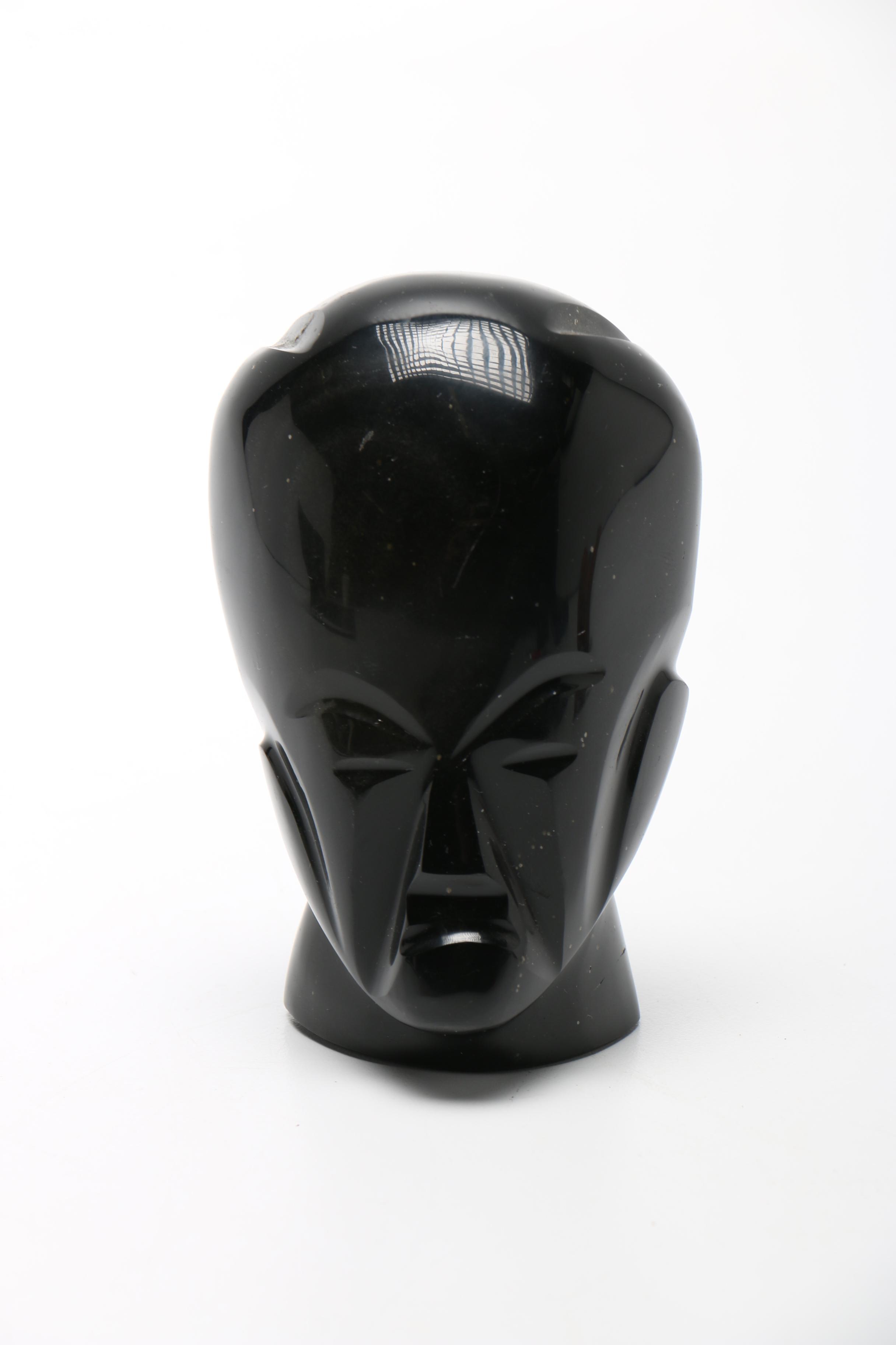 Pair Of Carved Faces