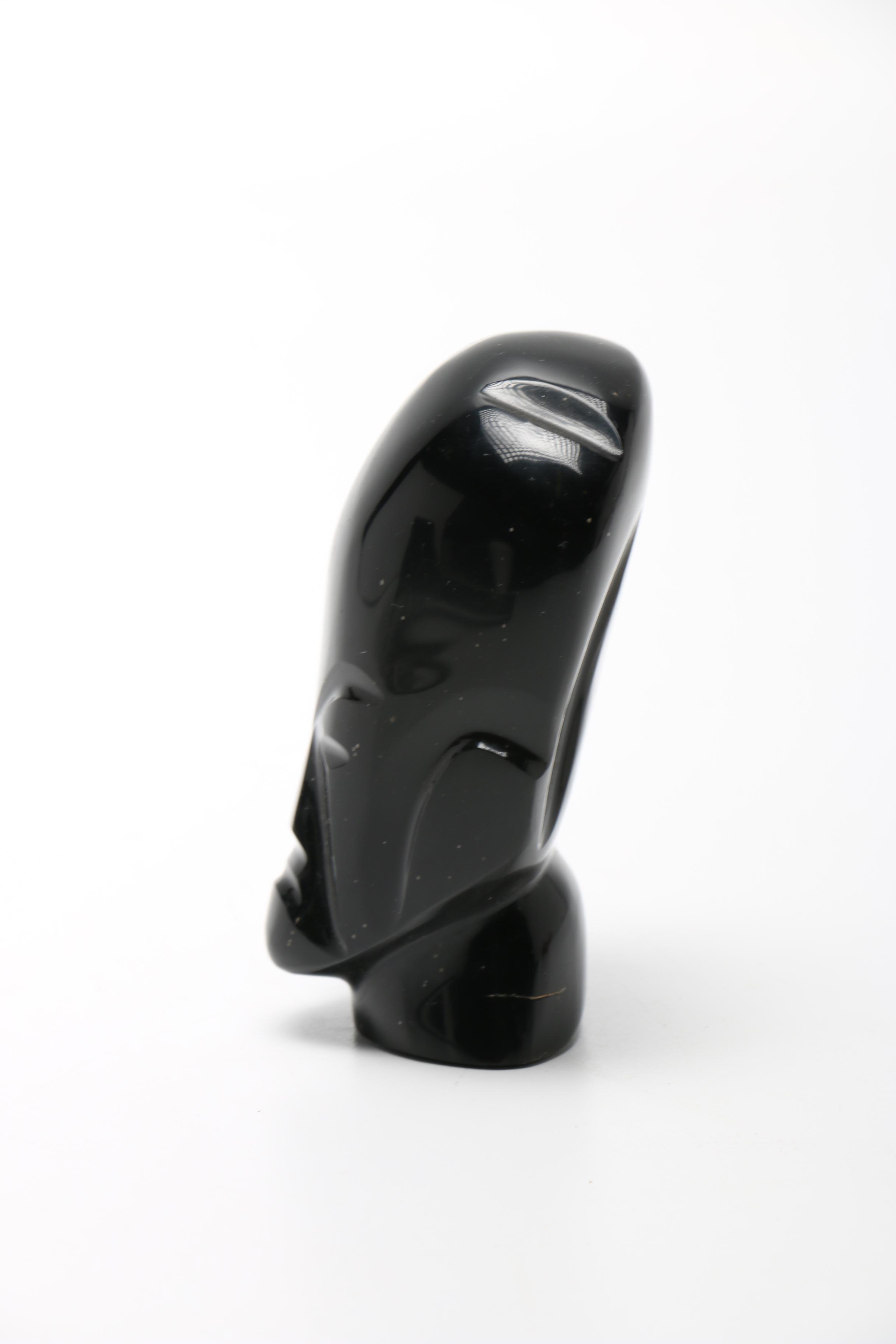 Pair Of Carved Faces