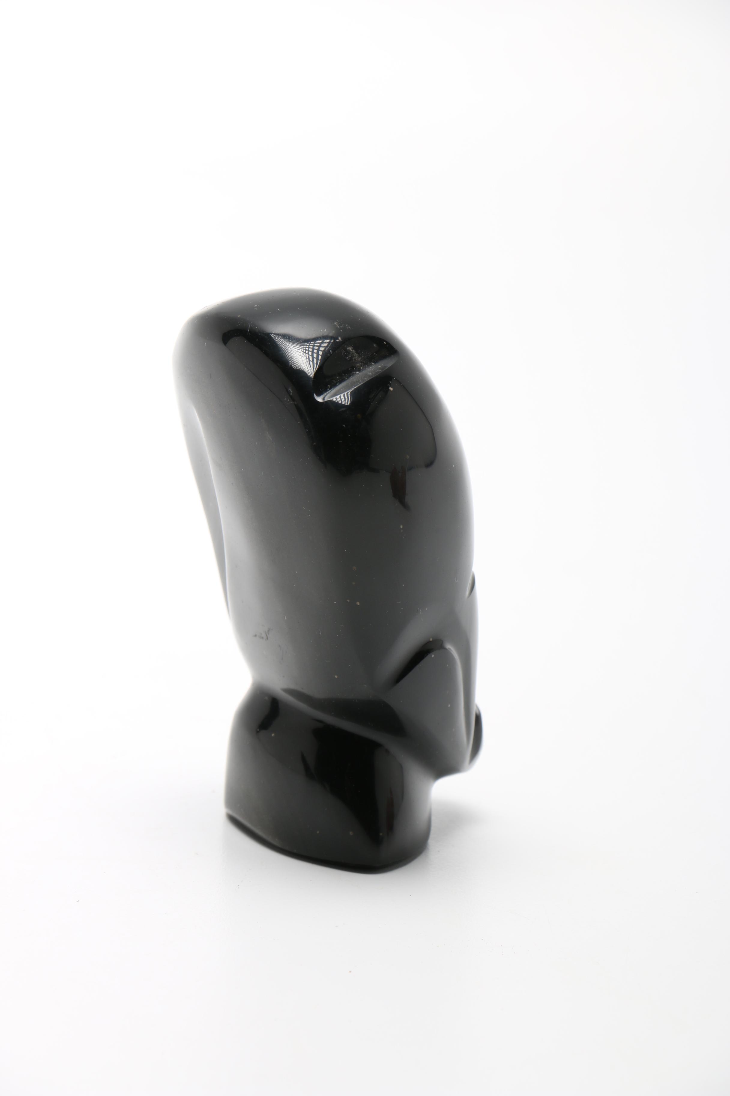 Pair Of Carved Faces