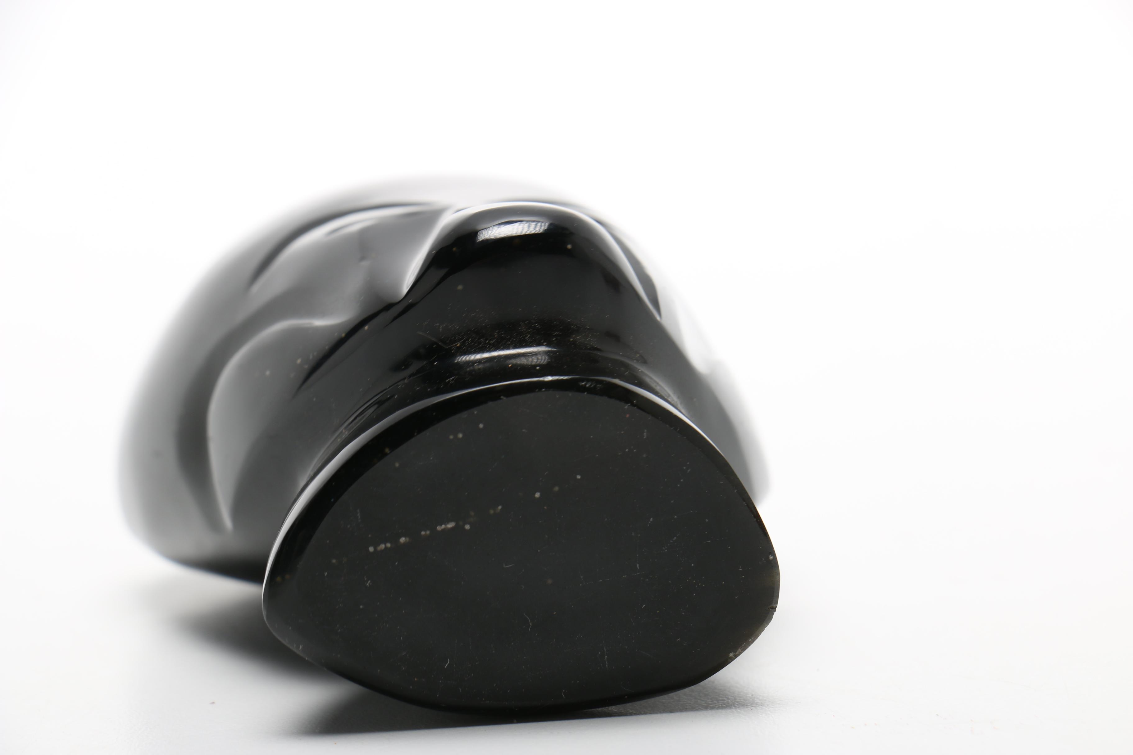 Pair Of Carved Faces