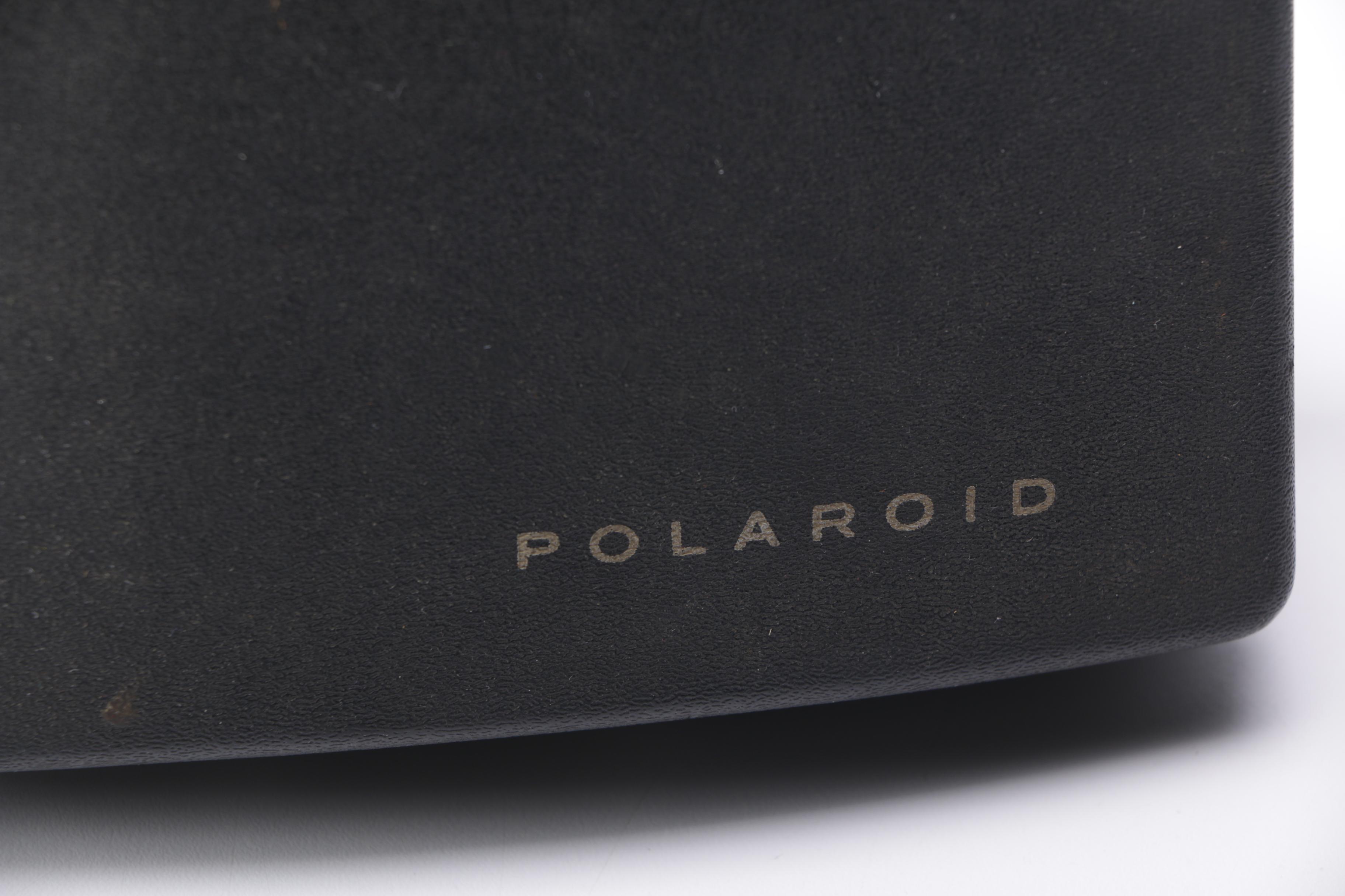 Polaroid Land Camera and Flash