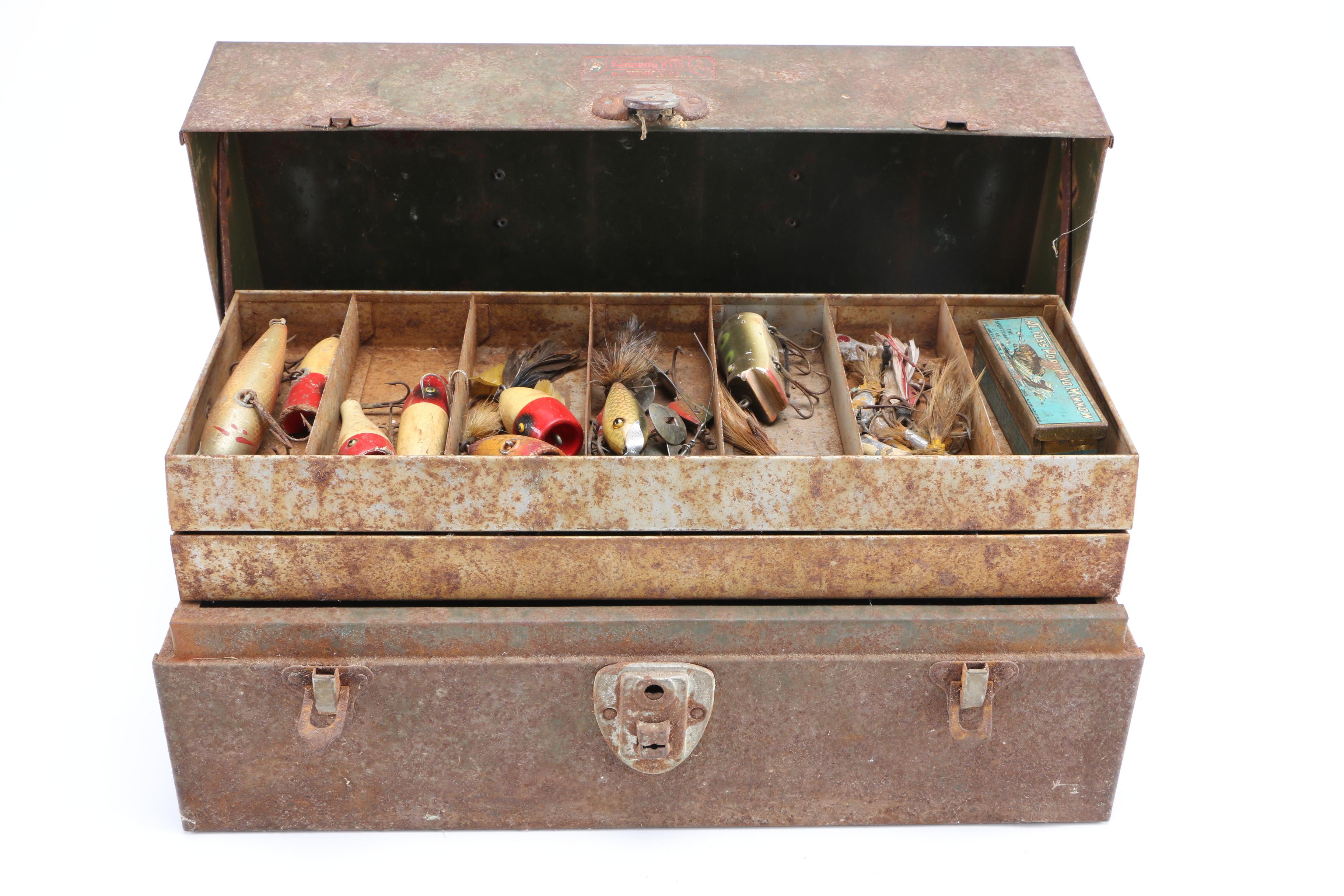 Collection of Vintage Fishing Lures and Reels With Tackle Box
