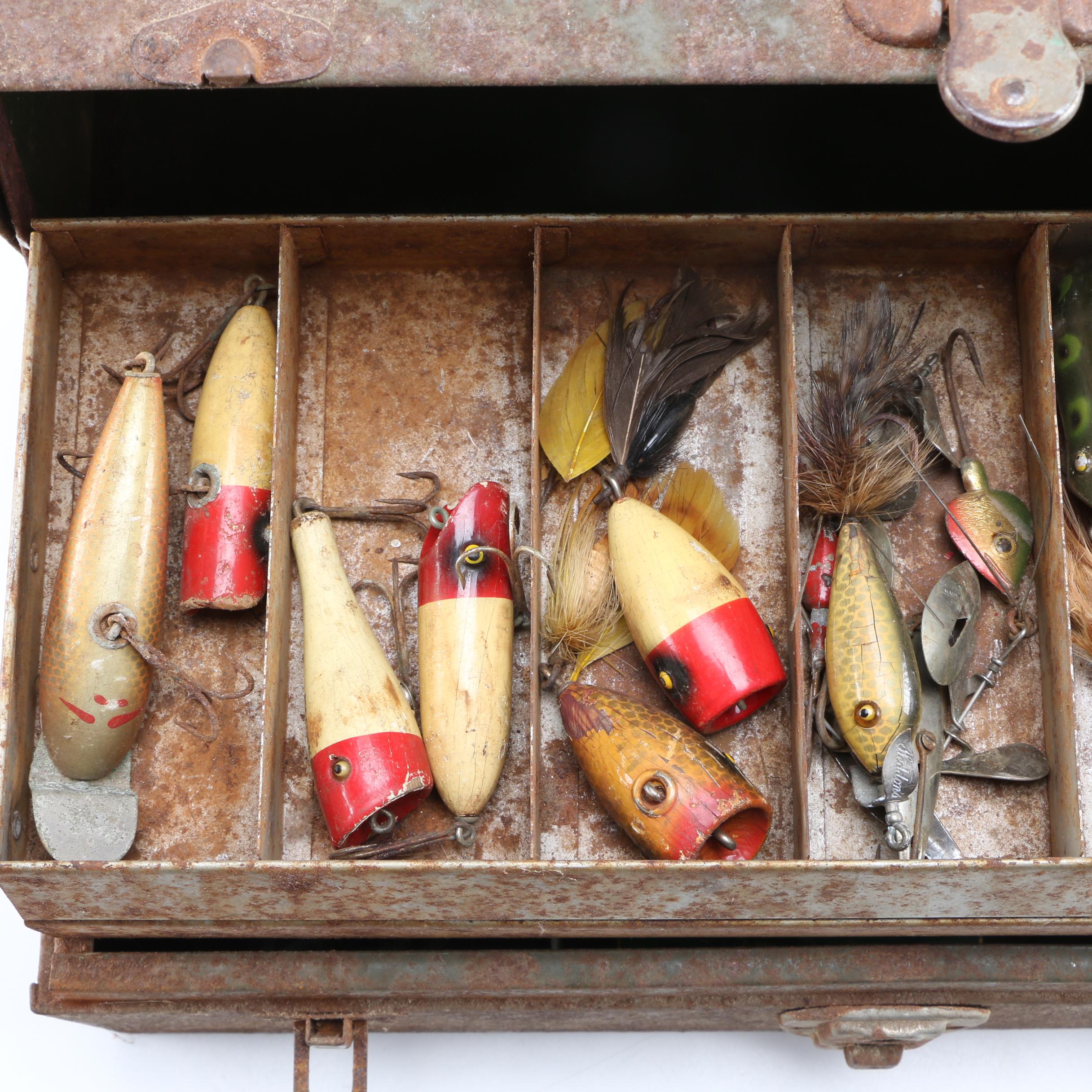 Collection of Vintage Fishing Lures and Reels With Tackle Box
