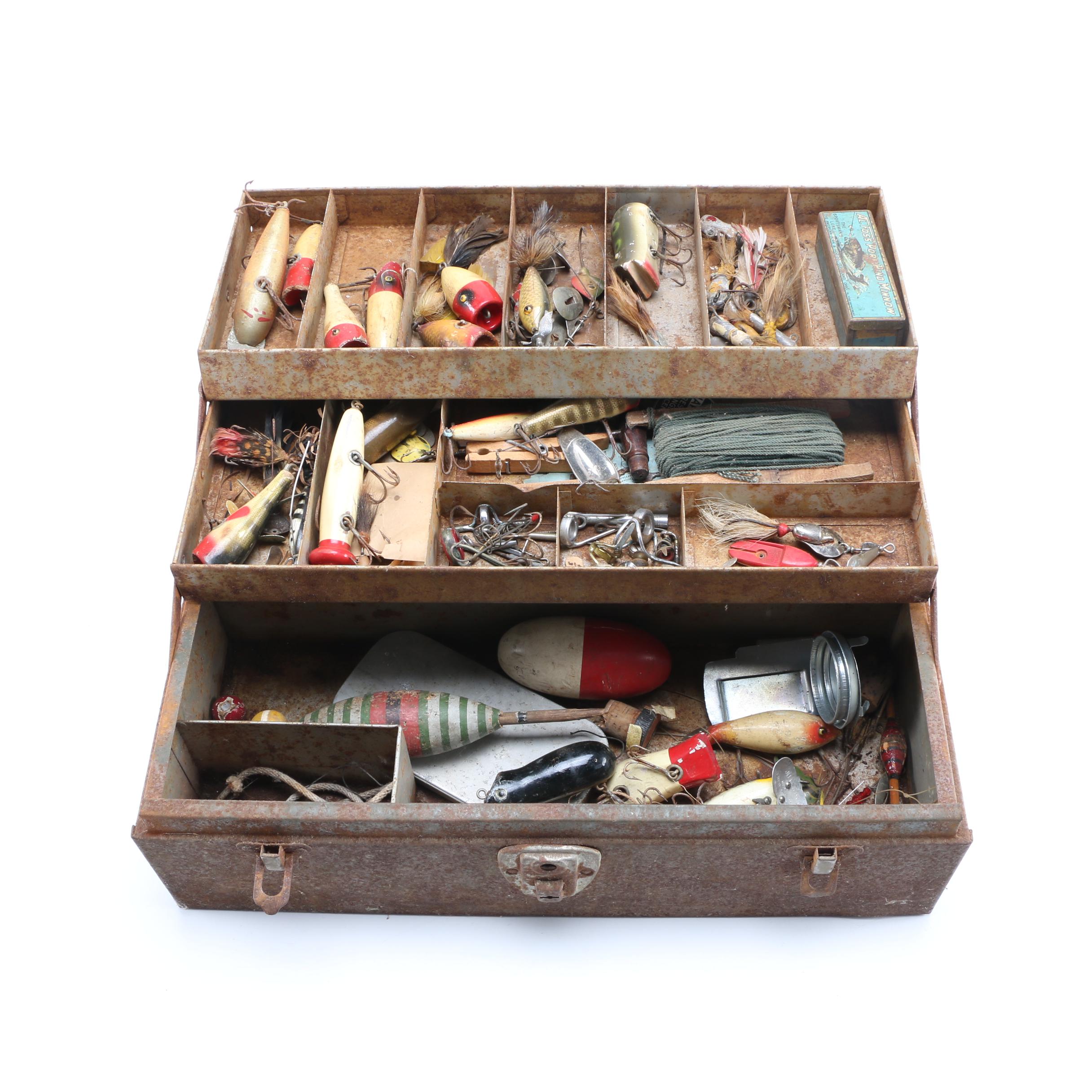 Collection of Vintage Fishing Lures and Reels With Tackle Box