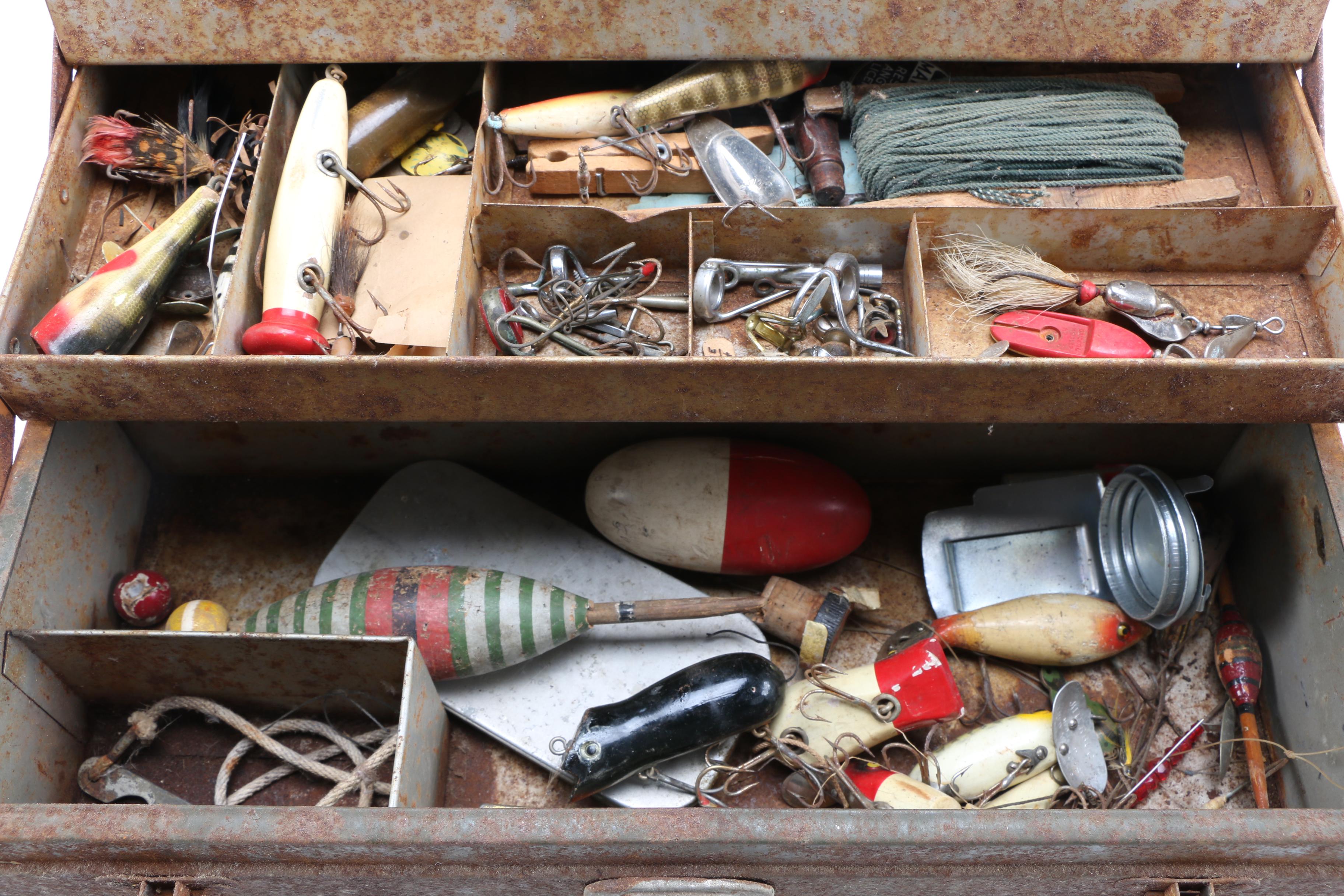 Collection of Vintage Fishing Lures and Reels With Tackle Box