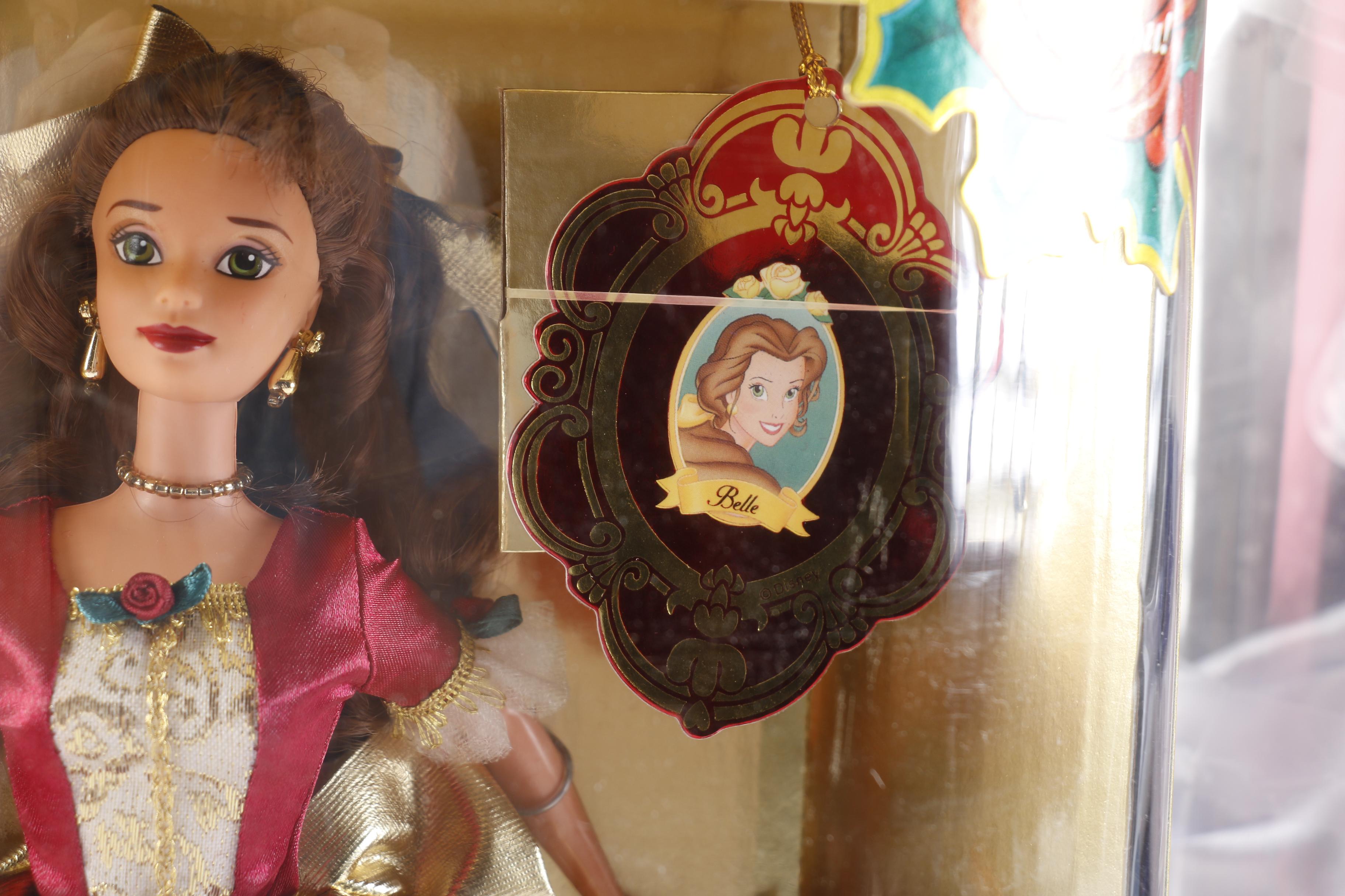 Collection of Disney and Barbie Dolls