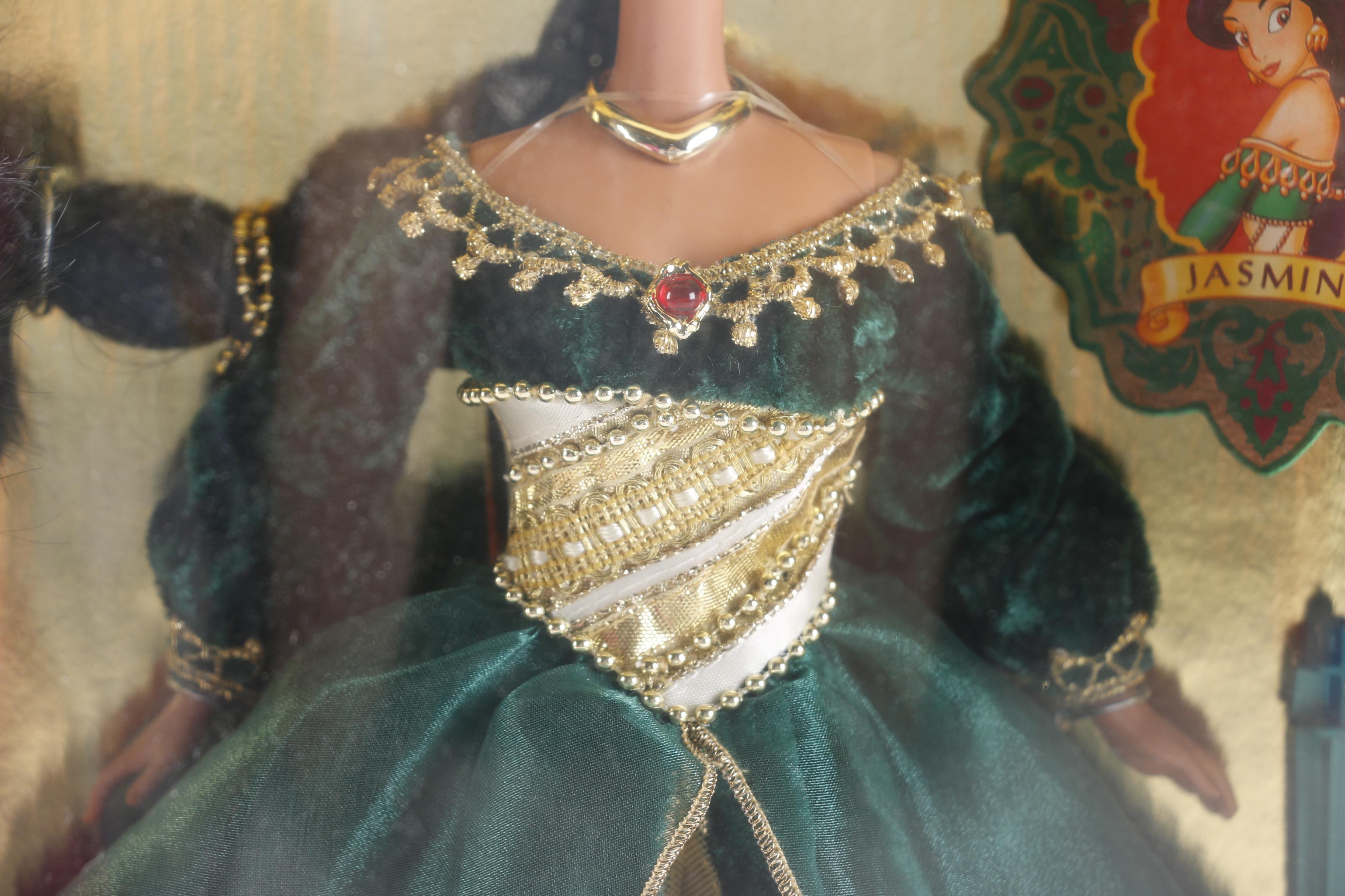 Collection of Disney and Barbie Dolls