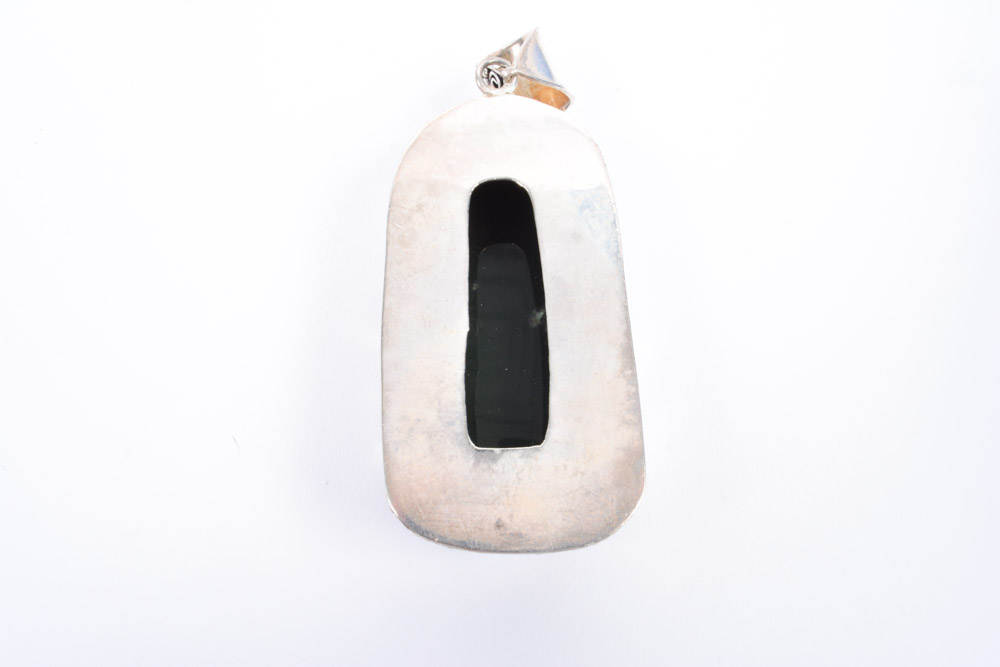 Silver Tone Jewelry Collection Featuring Carved bone