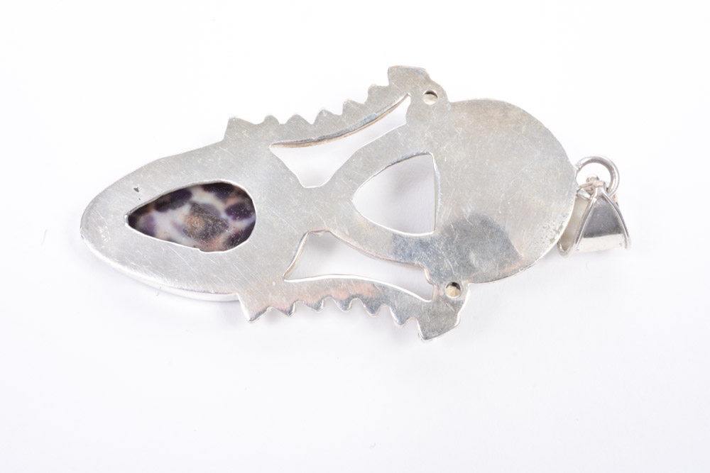 Silver Tone Jewelry Collection Featuring Carved bone