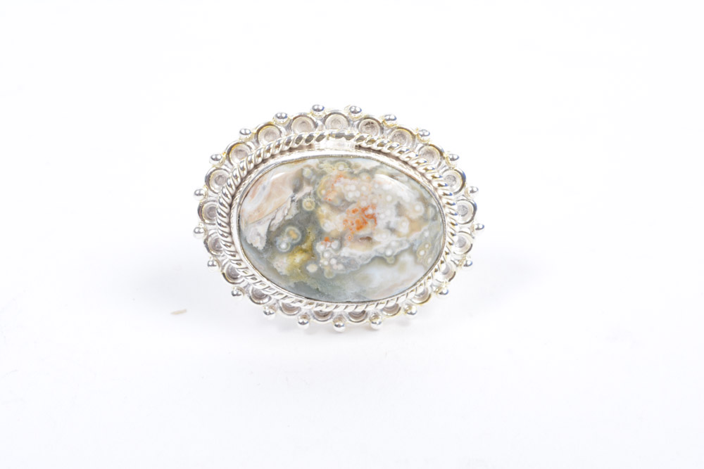 Silver Tone Jewelry Collection Featuring Carved bone