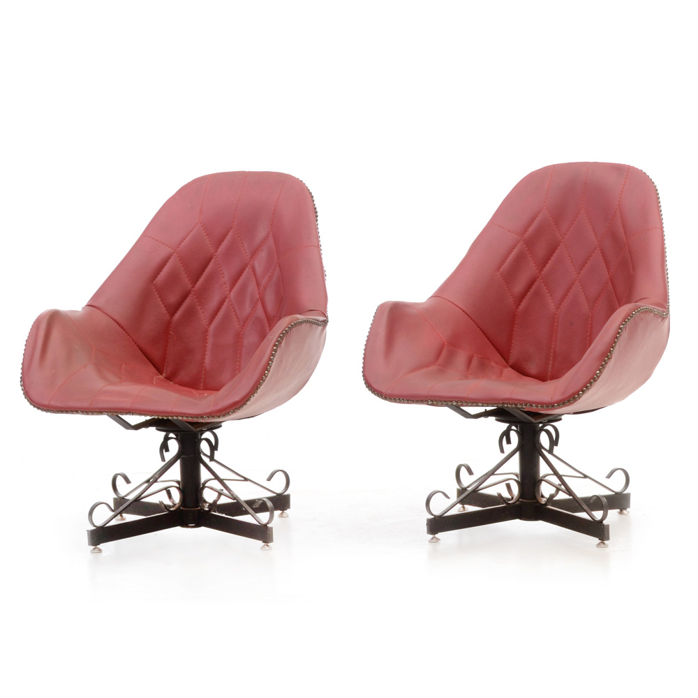 Pair of Red Vinyl Swivel Chairs